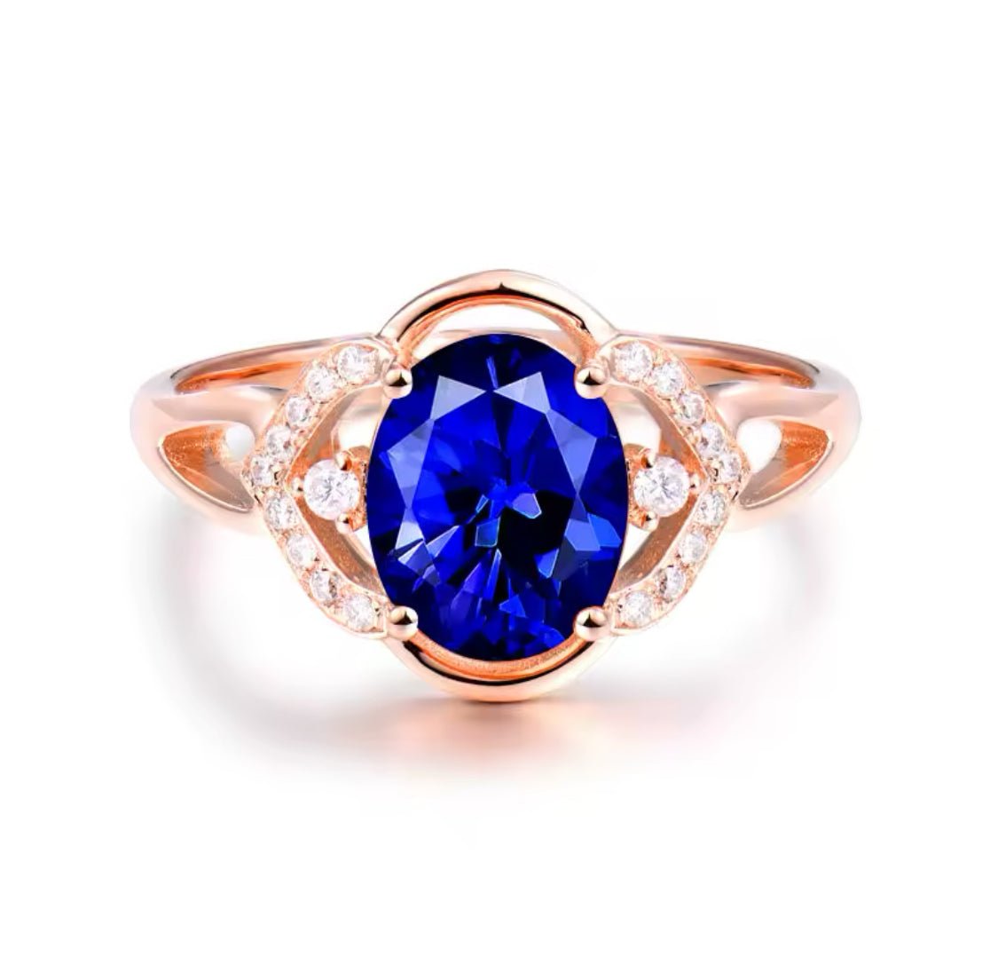 14Kt Rose Gold 1.70 ct Tanzanite Ring with Diamonds