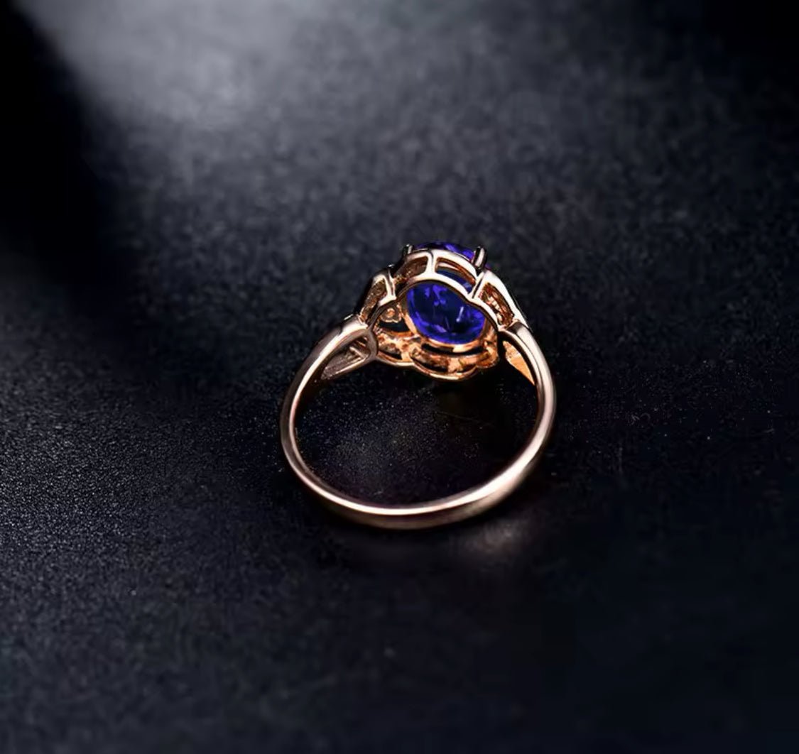 14Kt Rose Gold 1.70 ct Tanzanite Ring with Diamonds