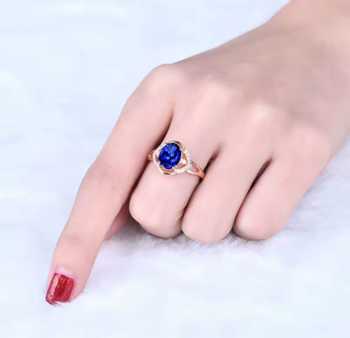 14Kt Rose Gold 1.70 ct Tanzanite Ring with Diamonds