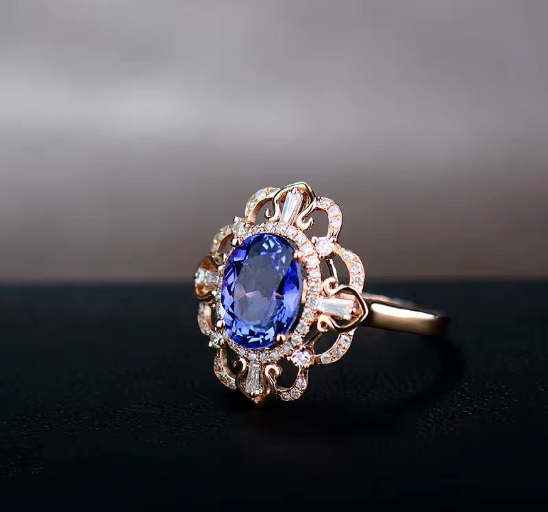 18Kt Rose Gold 2.28 ct Tanzanite Ring with Diamonds