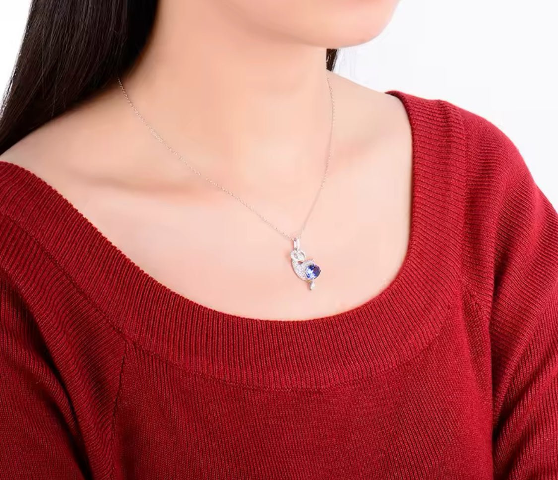 18Kt White Gold Diamonds 2.29 ct Tanzanite Pendants