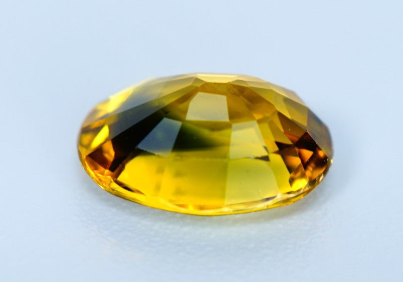 2.06 ct Australian green yellow sapphire oval side view