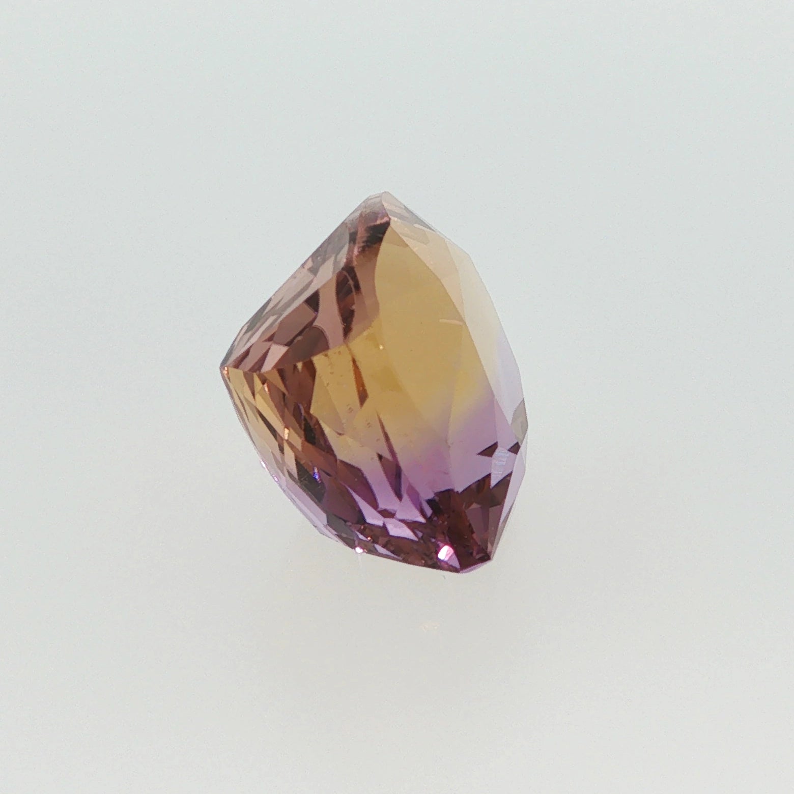 Natural ametrine quartz, 13.20 carats, cushion cut, transparent clarity, violetish purple and orangy yellow, ČGL certified