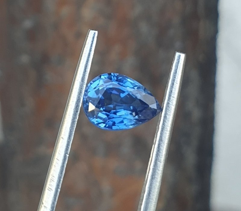 Natural blue sapphire, 1.13 carats, pear mixed cut, transparent blue color, heated, IGI certified gemstone