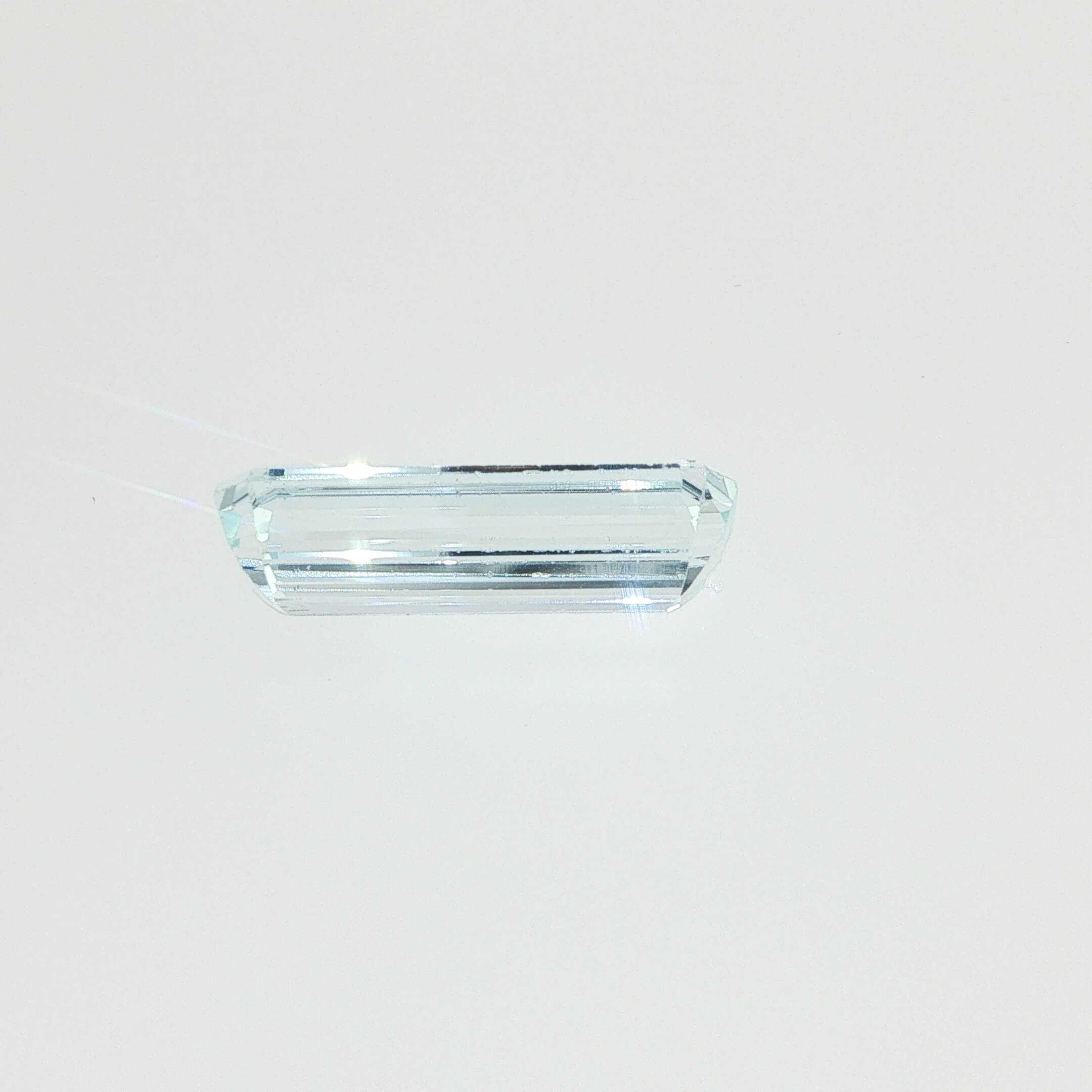 Natural aquamarine, 4.83 carats, emerald cut, eye-clean clarity, light blue color, transparent gemstone