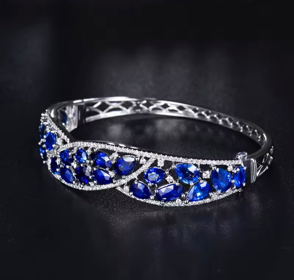 Blue Sapphire & Diamond Bangle – 18K White Gold, 14.64 g