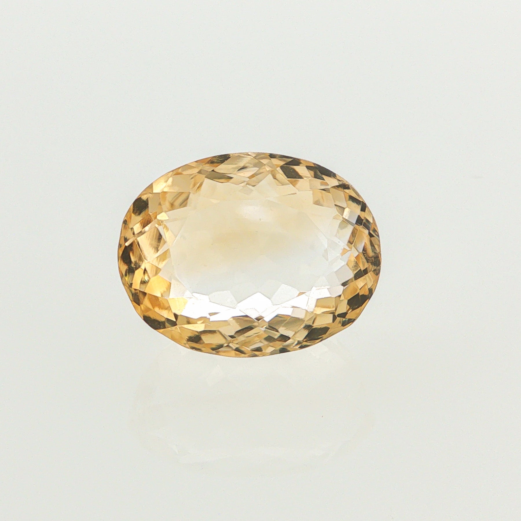 Natural heated citrine, yellow, oval cut, 17.99 ct, loose gemstone.