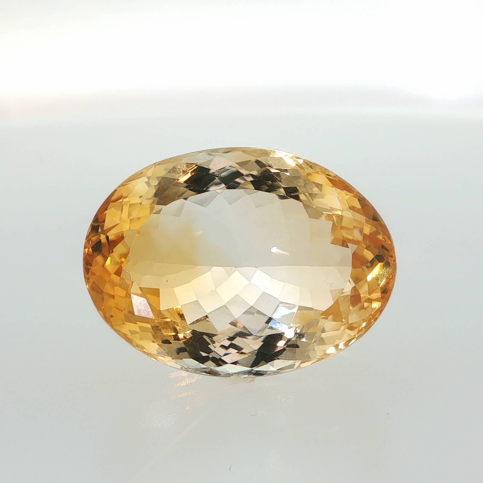 Natural citrine, oval cut, 65.18 ct, loose gemstone.