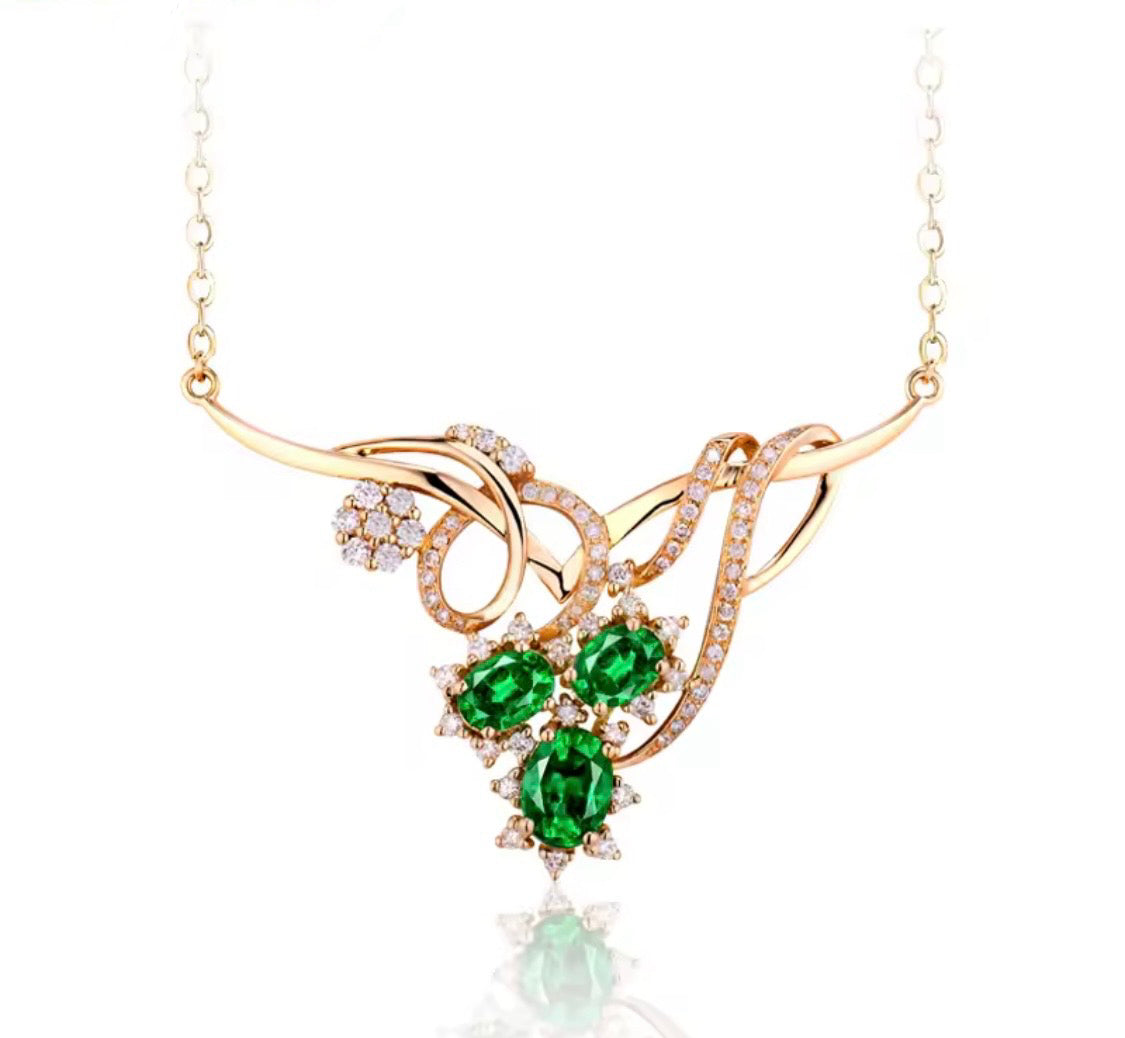 18K gold emerald diamond necklace with 1.72 carat natural emeralds and floral design