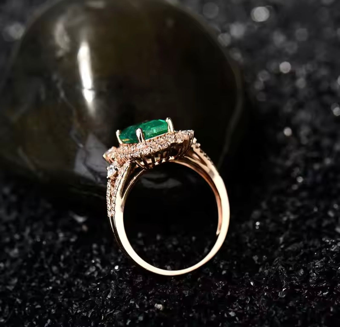 14K gold emerald diamond ring with 1.65 carat emerald cut natural emerald and diamond halo available in white yellow and rose gold
