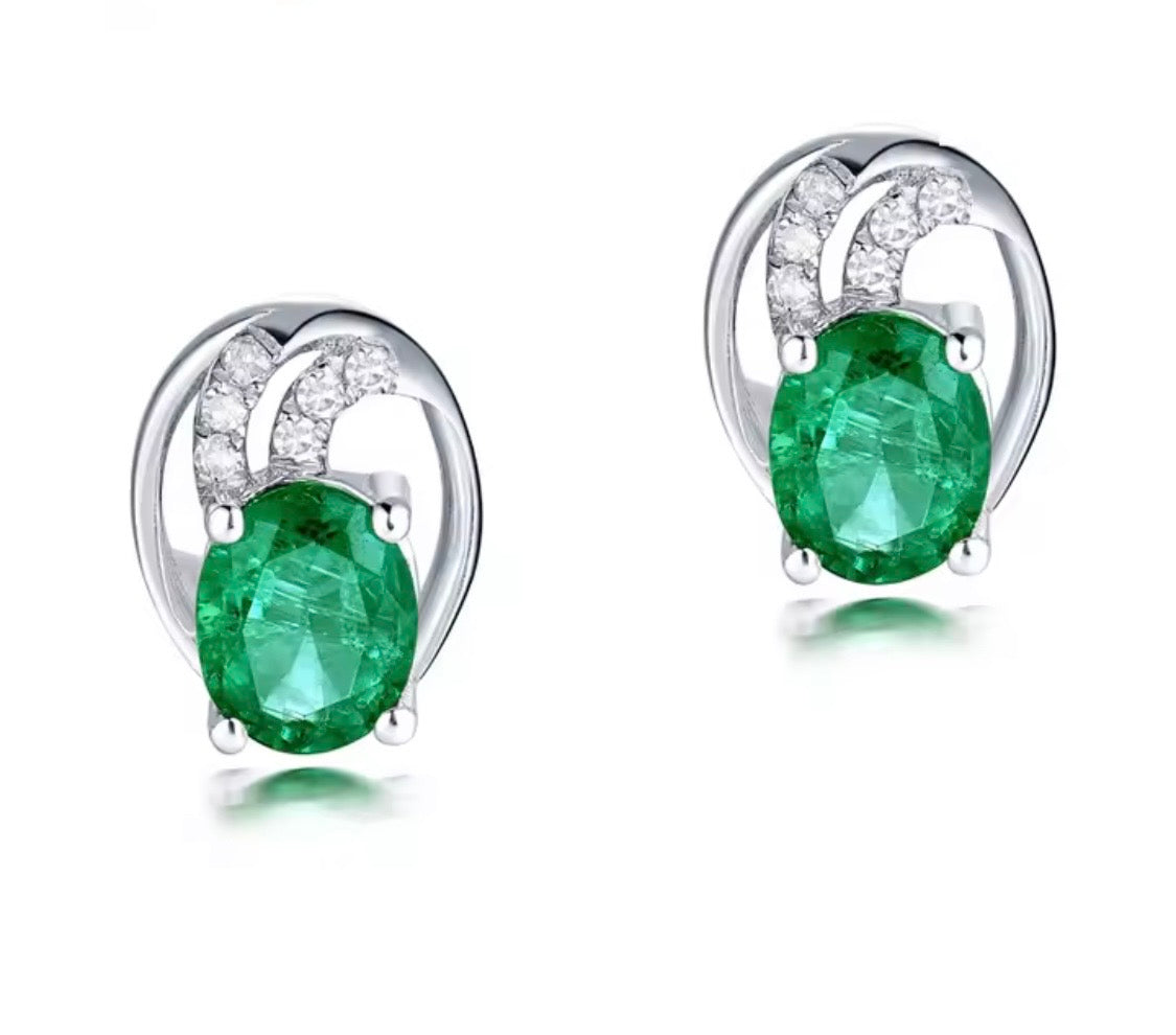 18K gold emerald stud earrings with oval 4x5mm gemstones and vintage swirl design