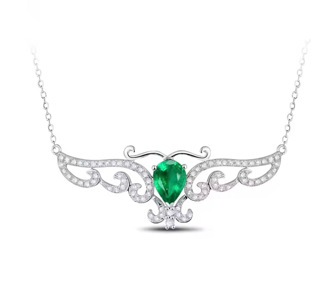 18K gold emerald diamond pendant with 0.66 carat pear cut natural emerald and angel wings design