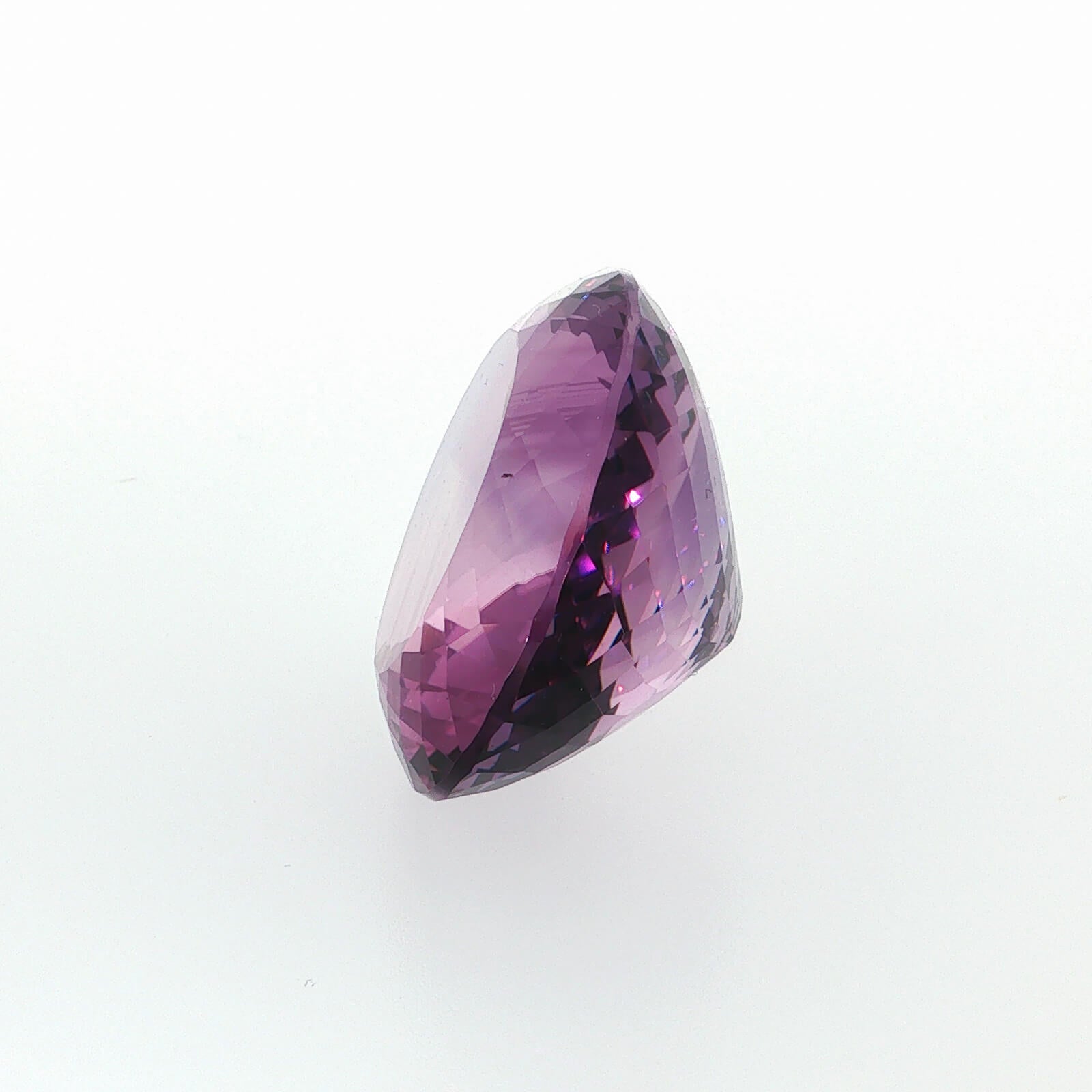 Natural amethyst, 106.80 carats, oval cut, clarity: eye clean, purple color, measuring 35.65 × 29.53 × 17.48 mm