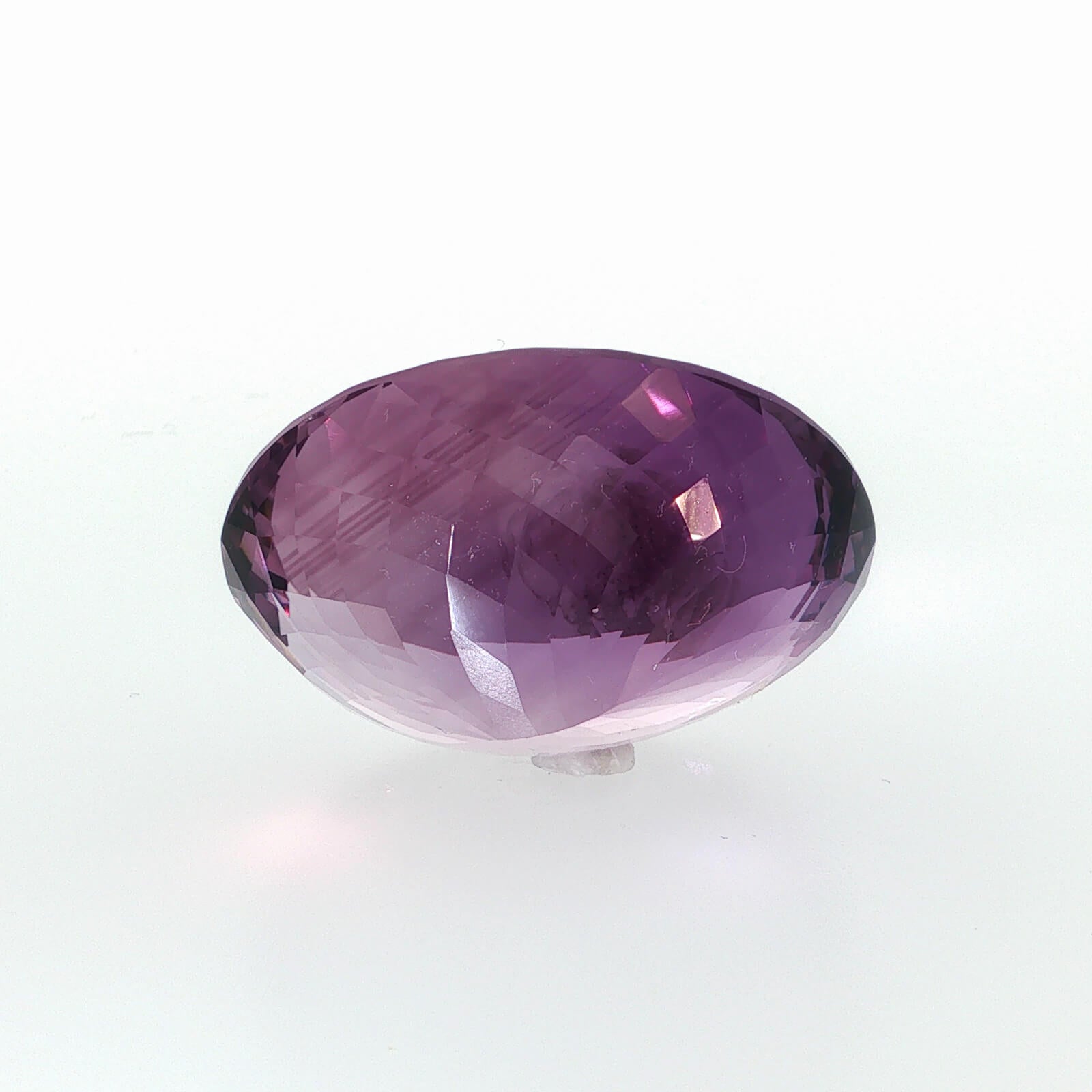 Natural amethyst, 106.80 carats, oval cut, clarity: eye clean, purple color, measuring 35.65 × 29.53 × 17.48 mm