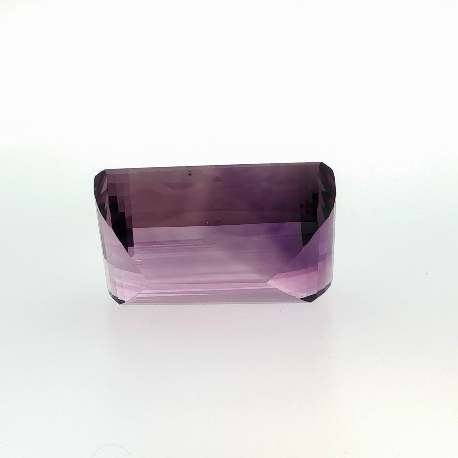 Natural amethyst, 144.05 carats, emerald cut, clarity: eye clean, purple color, measuring 36.80 × 23.60 × 17.48 mm