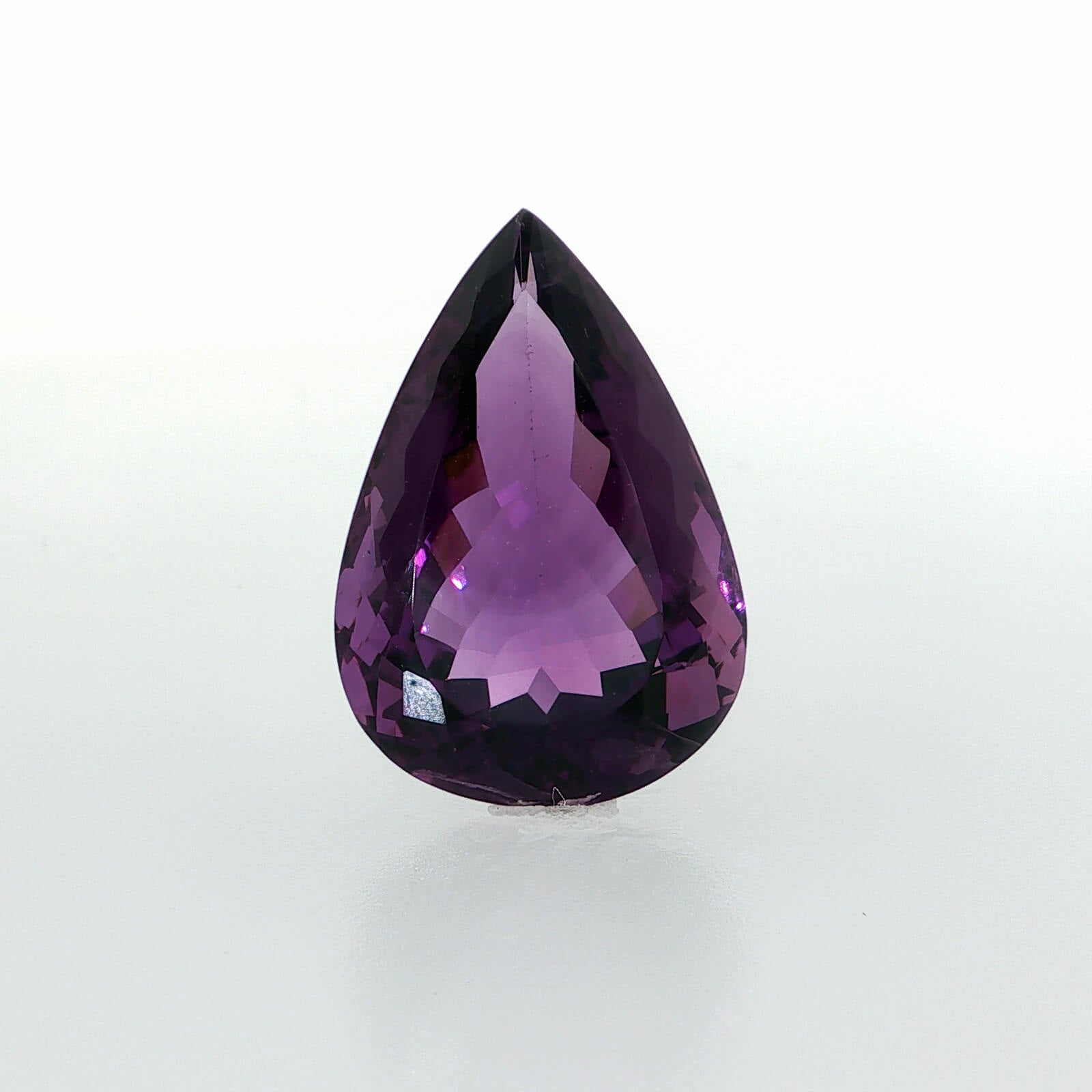 Natural amethyst, 26.49 carats, pear cut, clarity: eye clean, rich purple color, measuring 26.24 × 18.05 × 11.27 mm