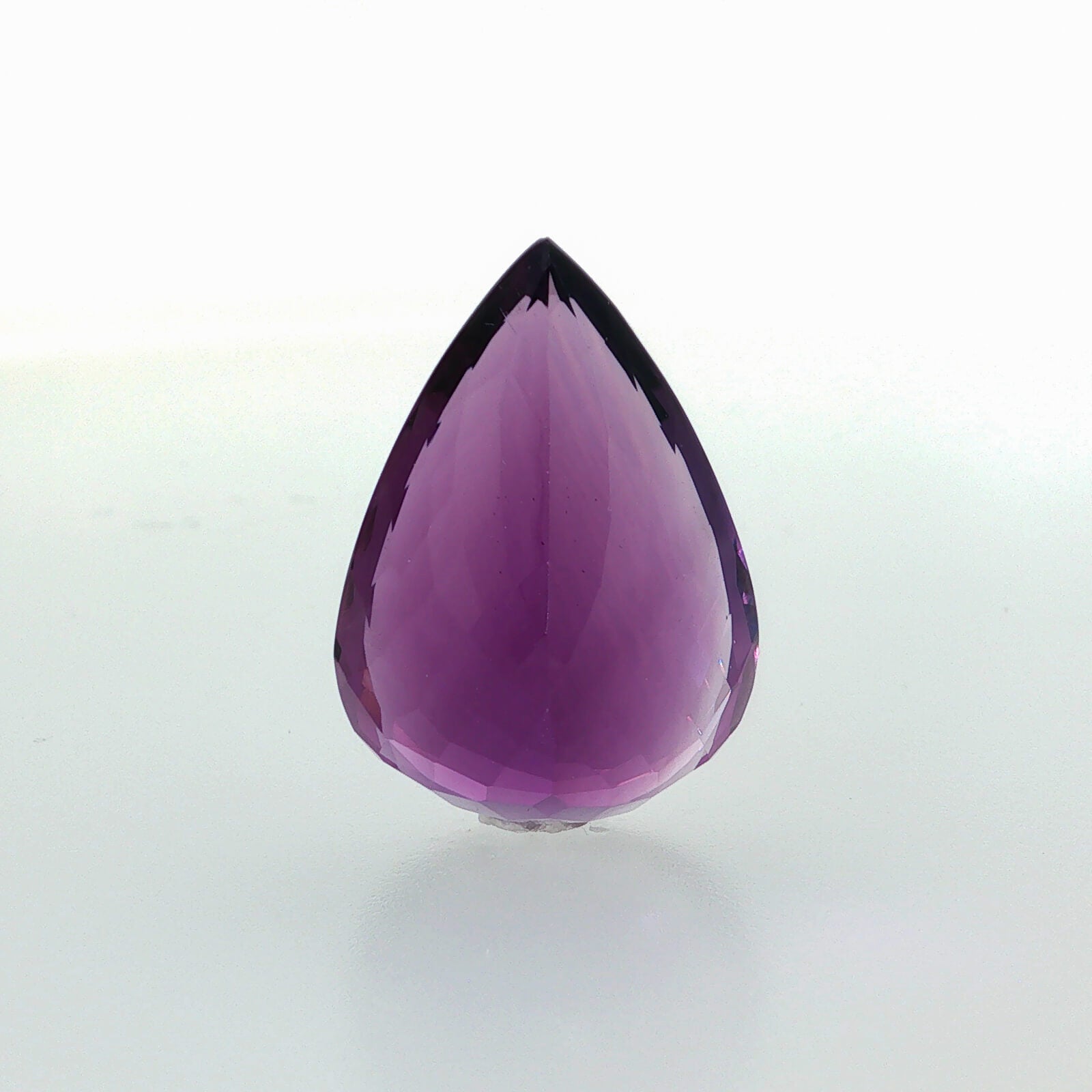Natural amethyst, 26.49 carats, pear cut, clarity: eye clean, rich purple color, measuring 26.24 × 18.05 × 11.27 mm