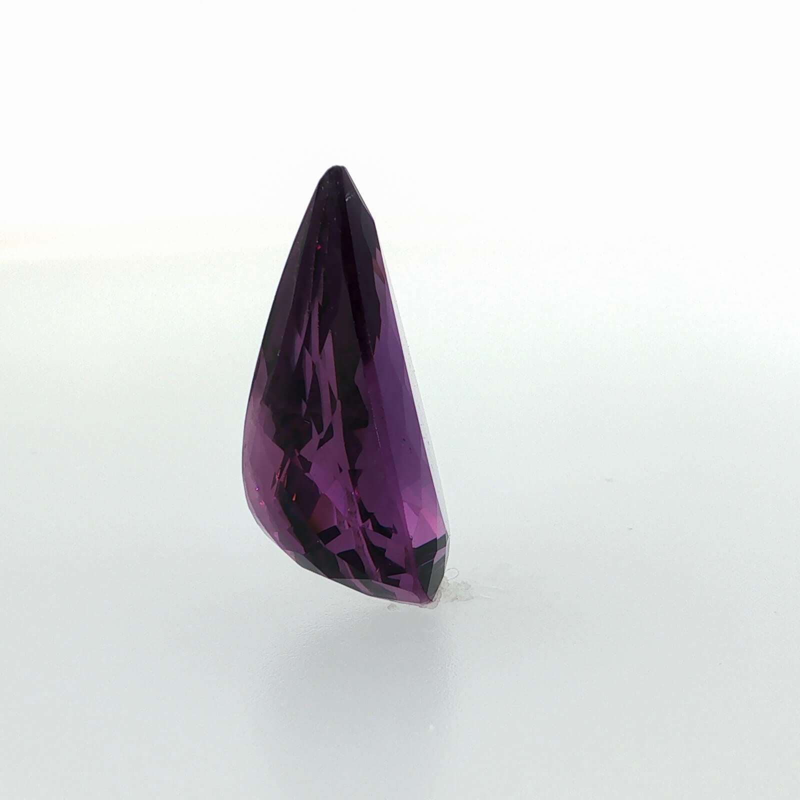 Natural amethyst, 26.49 carats, pear cut, clarity: eye clean, rich purple color, measuring 26.24 × 18.05 × 11.27 mm