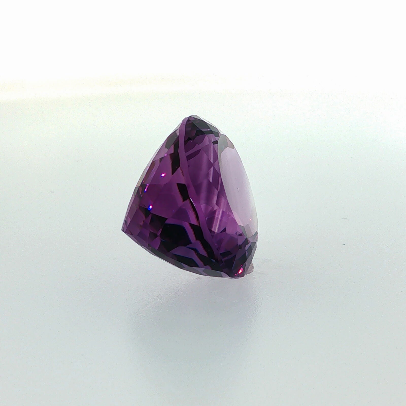 Natural amethyst, 33.56 carats, oval cut, clarity: eye clean, rich purple color, measuring 23.80 × 18.60 × 13.70 mm