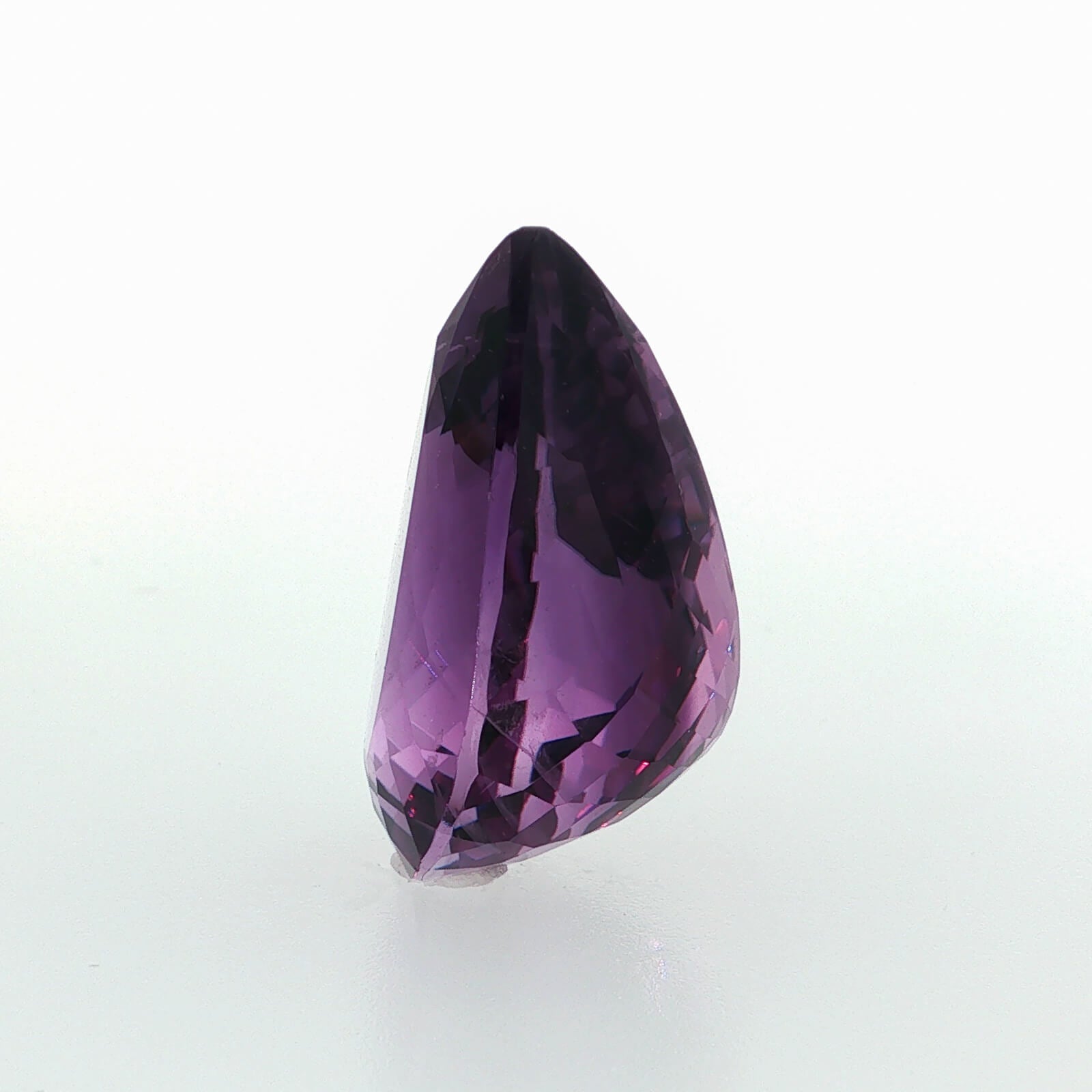Natural amethyst, 40.07 carats, pear cut, clarity: eye clean, vibrant purple color, measuring 25.39 × 21.24 × 13.74 mm
