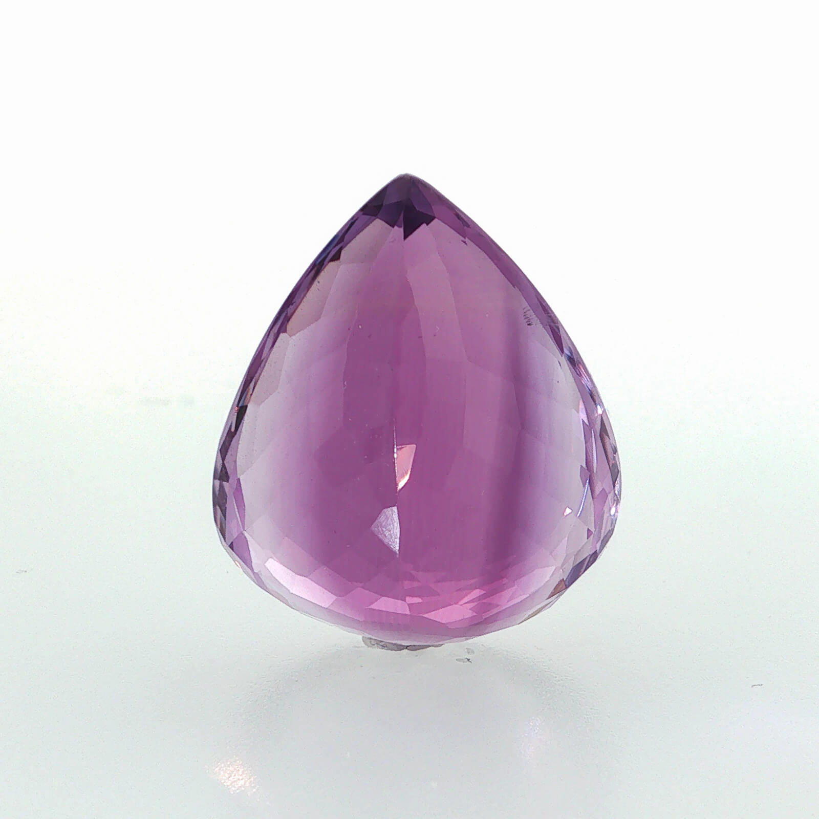 Natural amethyst, 40.07 carats, pear cut, clarity: eye clean, vibrant purple color, measuring 25.39 × 21.24 × 13.74 mm