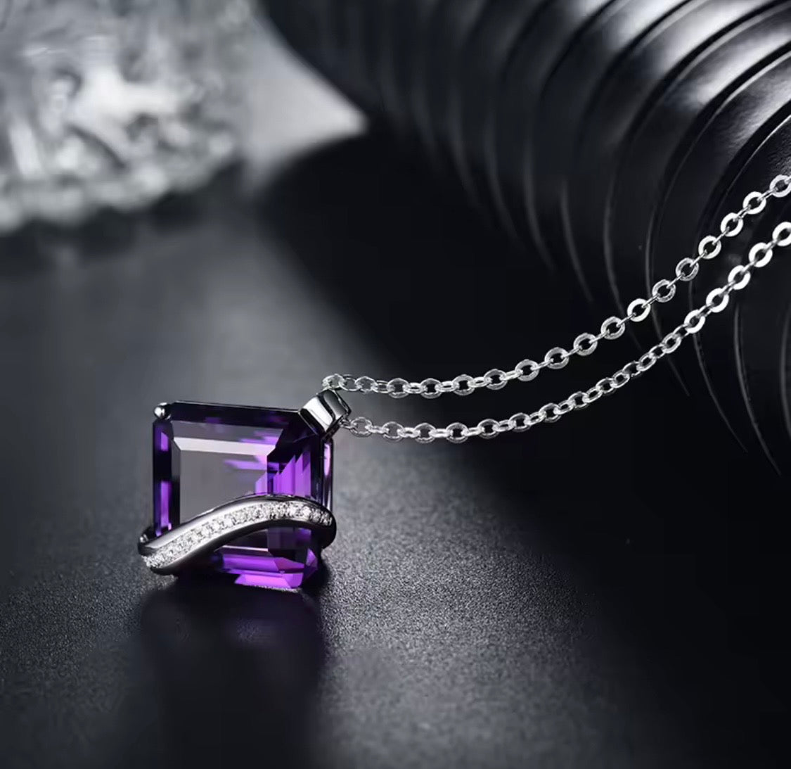 Natural purple amethyst and diamond statement pendant in 18K white gold lifestyle view