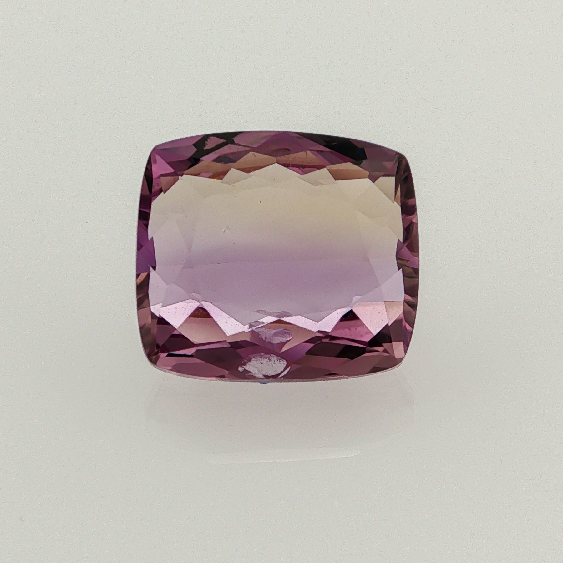 Natural ametrine, light purple / light yellow, cushion cut, 10.32 ct, loose gemstone.