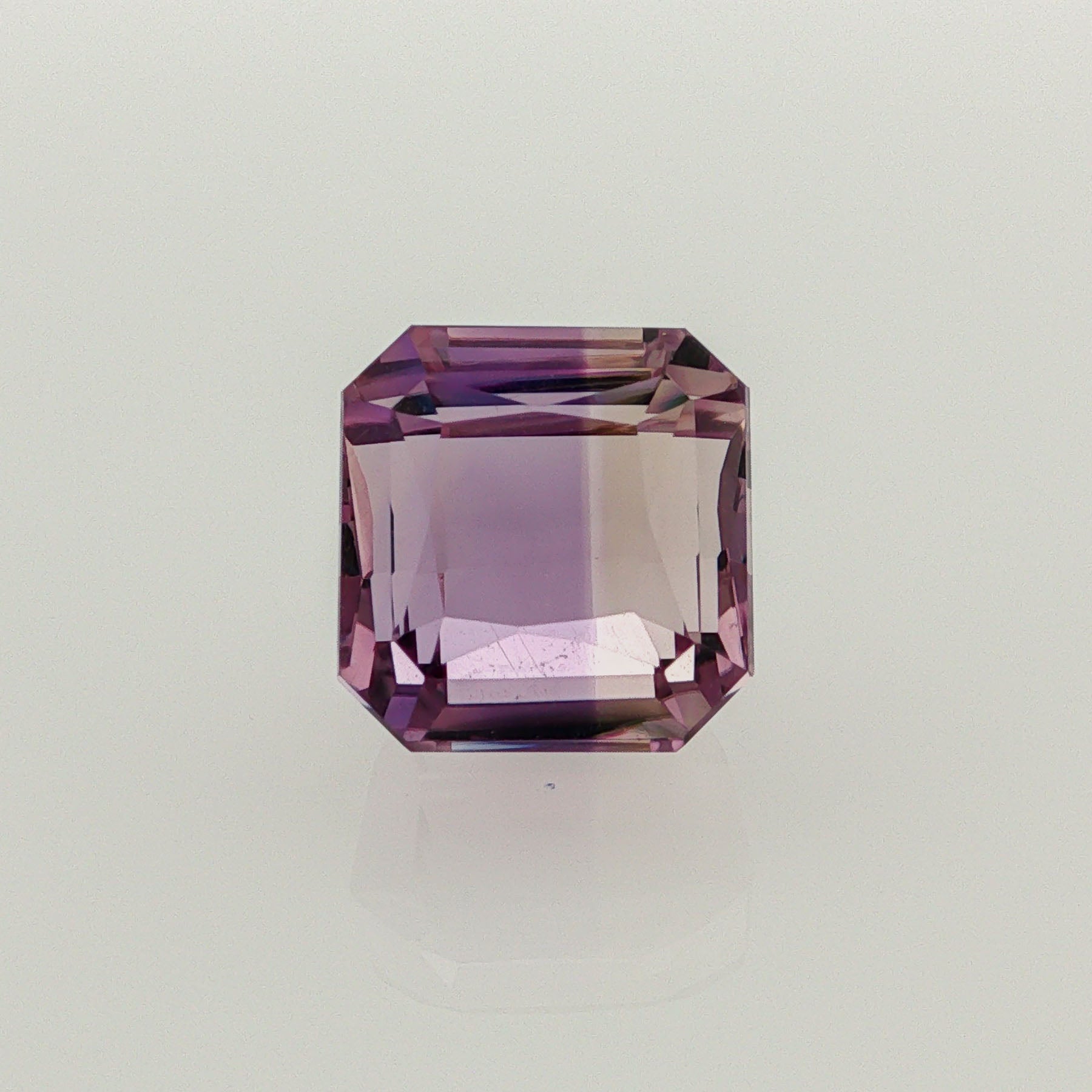Natural ametrine, bicolor - vivid purple / light yellow, octagon cut, 10.72 ct, loose gemstone.