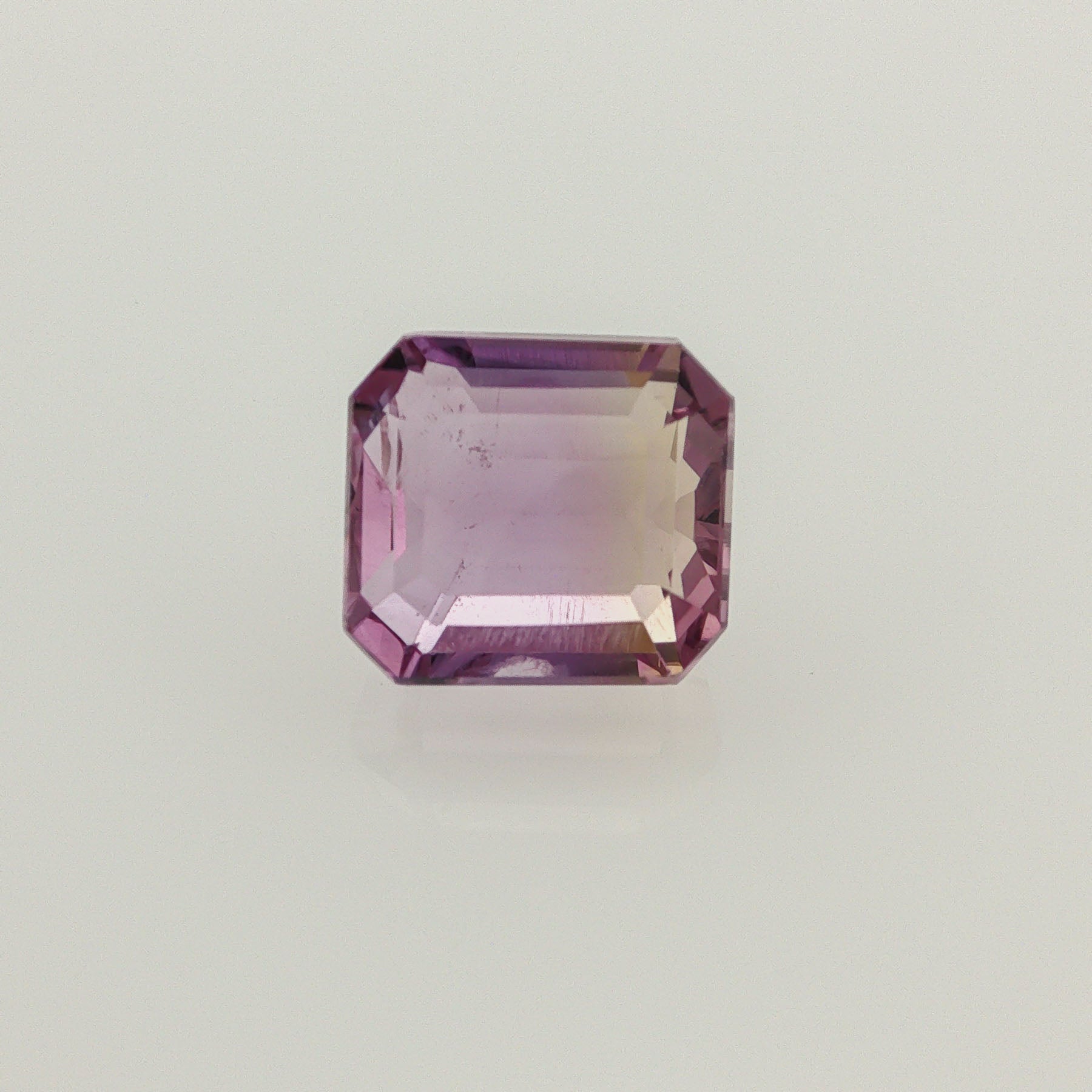 Natural ametrine, bicolor - purple / yellow, octagon cut, 10.88 ct, loose gemstone.