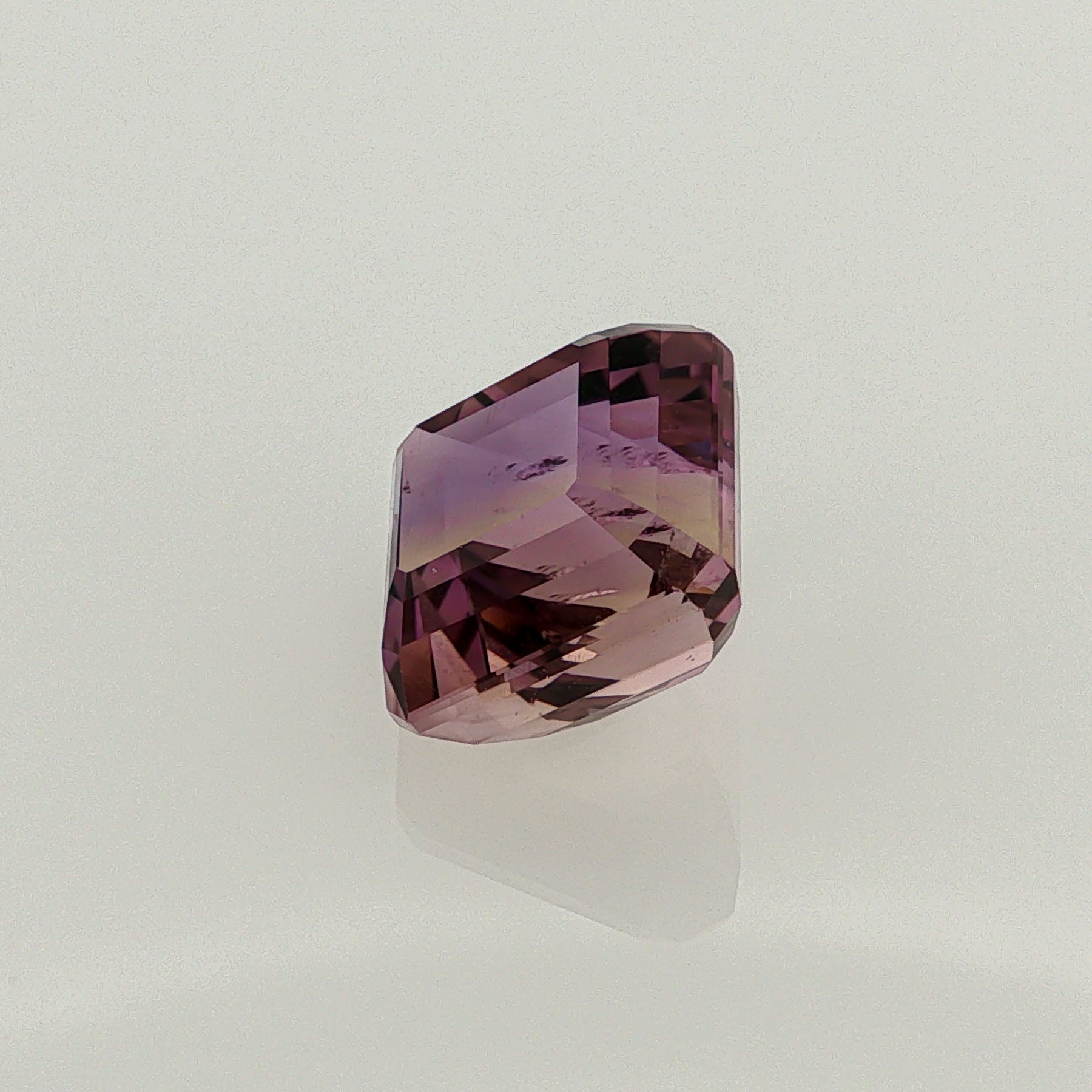 Natural ametrine, bicolor - purple / yellow, octagon cut, 12.78 ct, loose gemstone.