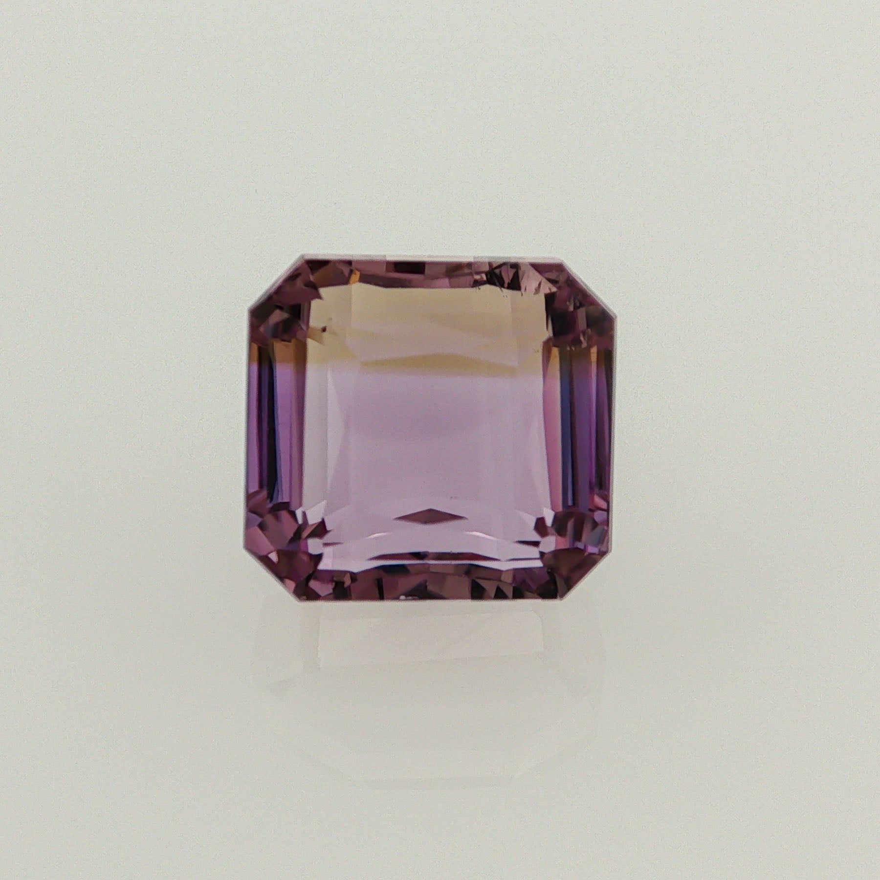Natural ametrine, light purple / light yellow, octagon cut, 12.82 ct, loose gemstone.