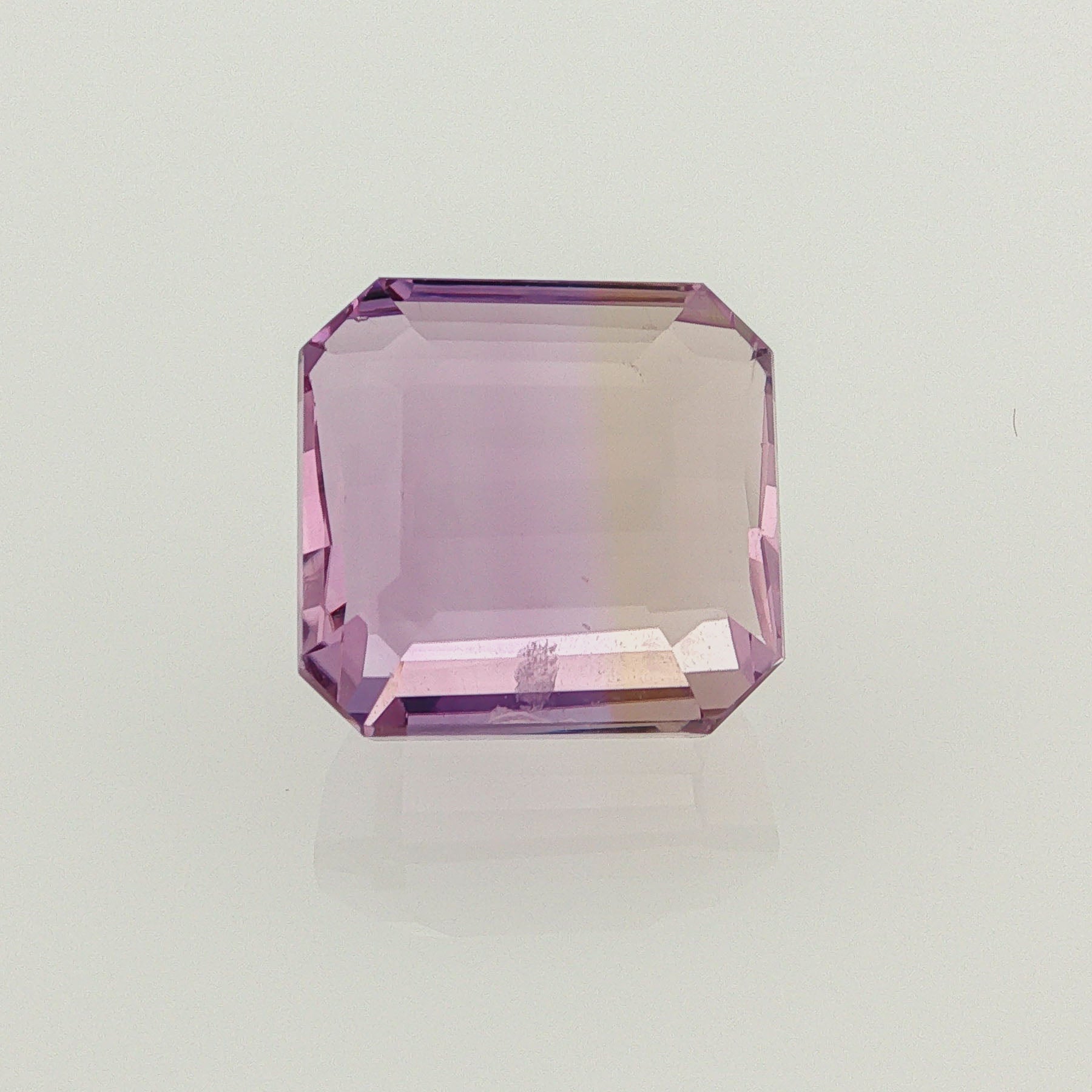 Natural ametrine, bicolor - purple / yellow, octagon cut, 13.22 ct, loose gemstone.