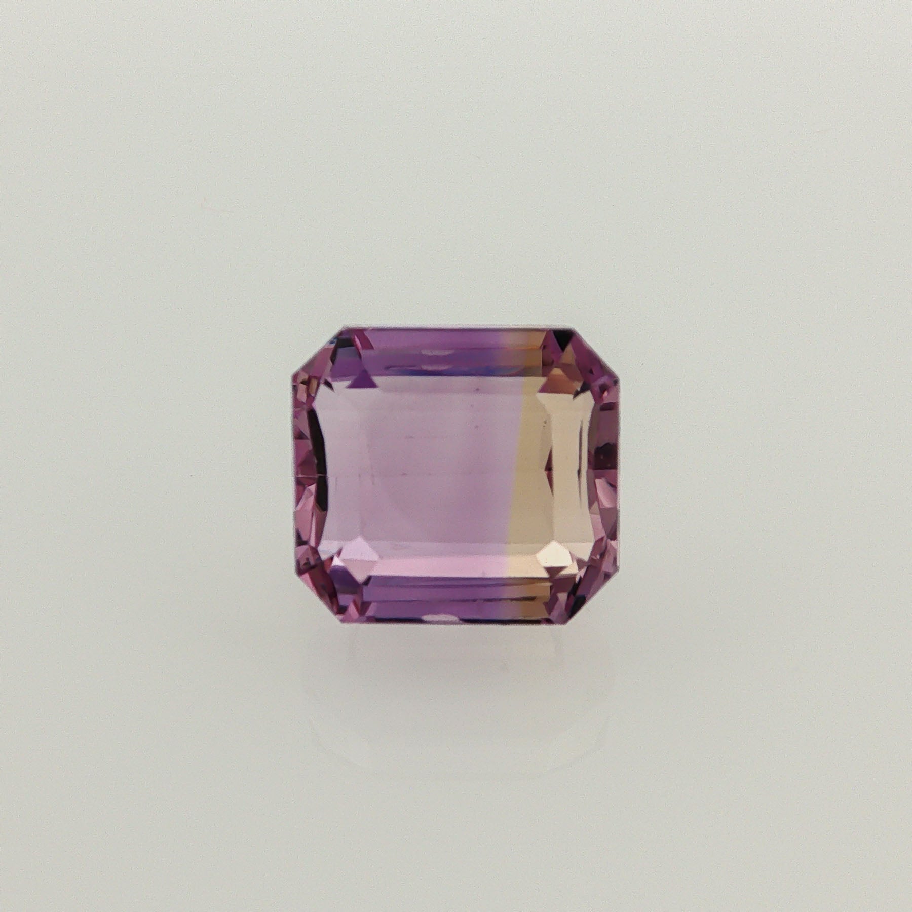 Natural ametrine, bicolor - purple / yellow, octagon cut, 13.64 ct, loose gemstone.