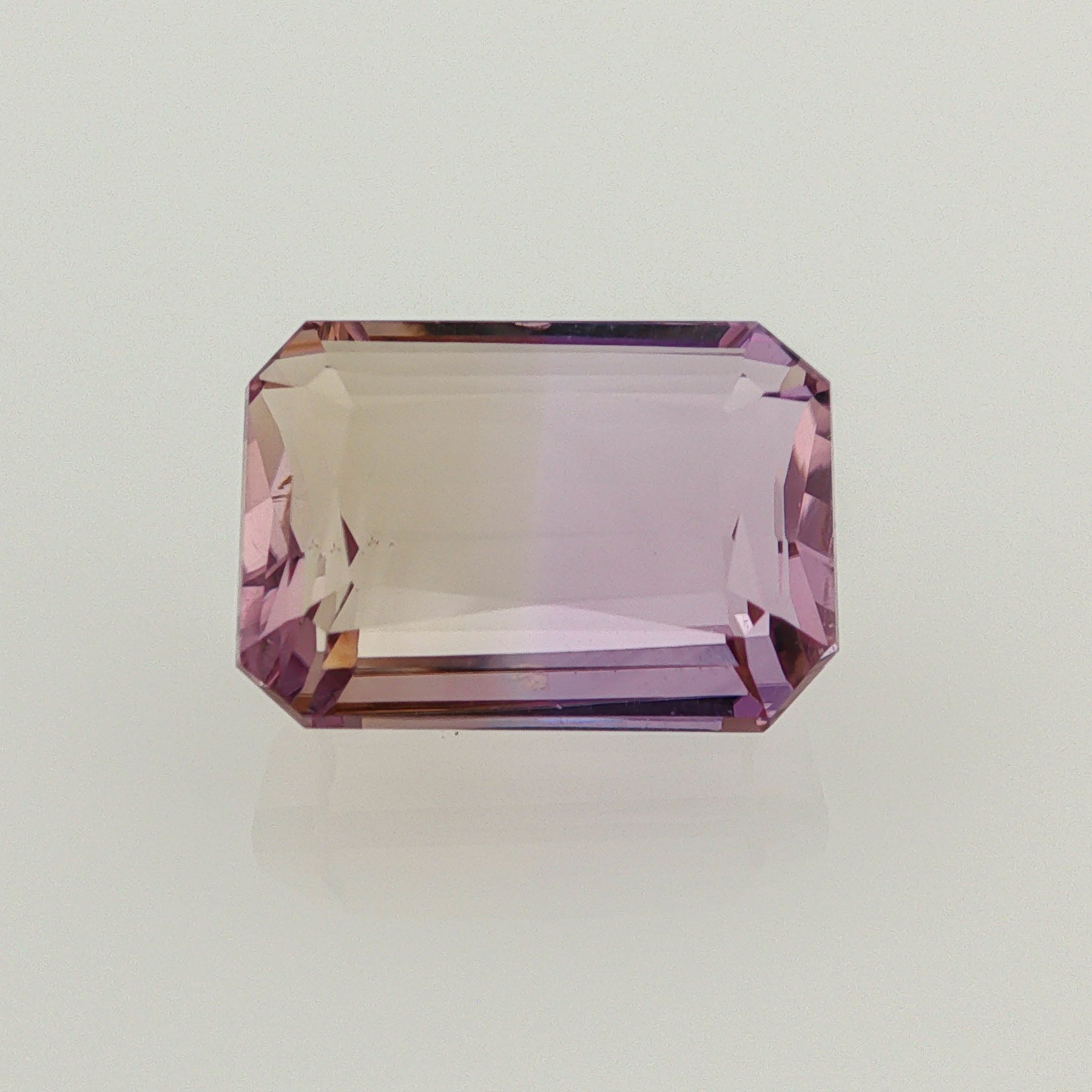 Natural ametrine, bicolor - purple / yellow, emerald cut, 13.79 ct, loose gemstone.