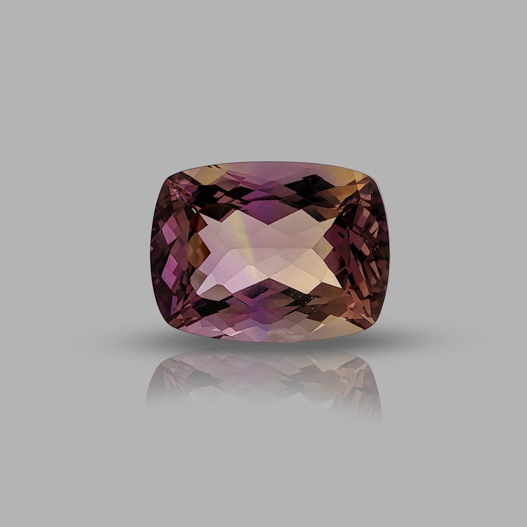Natural ametrine, light violetish purple / light orangy yellow, cushion cut, 14.77 ct, loose gemstone.