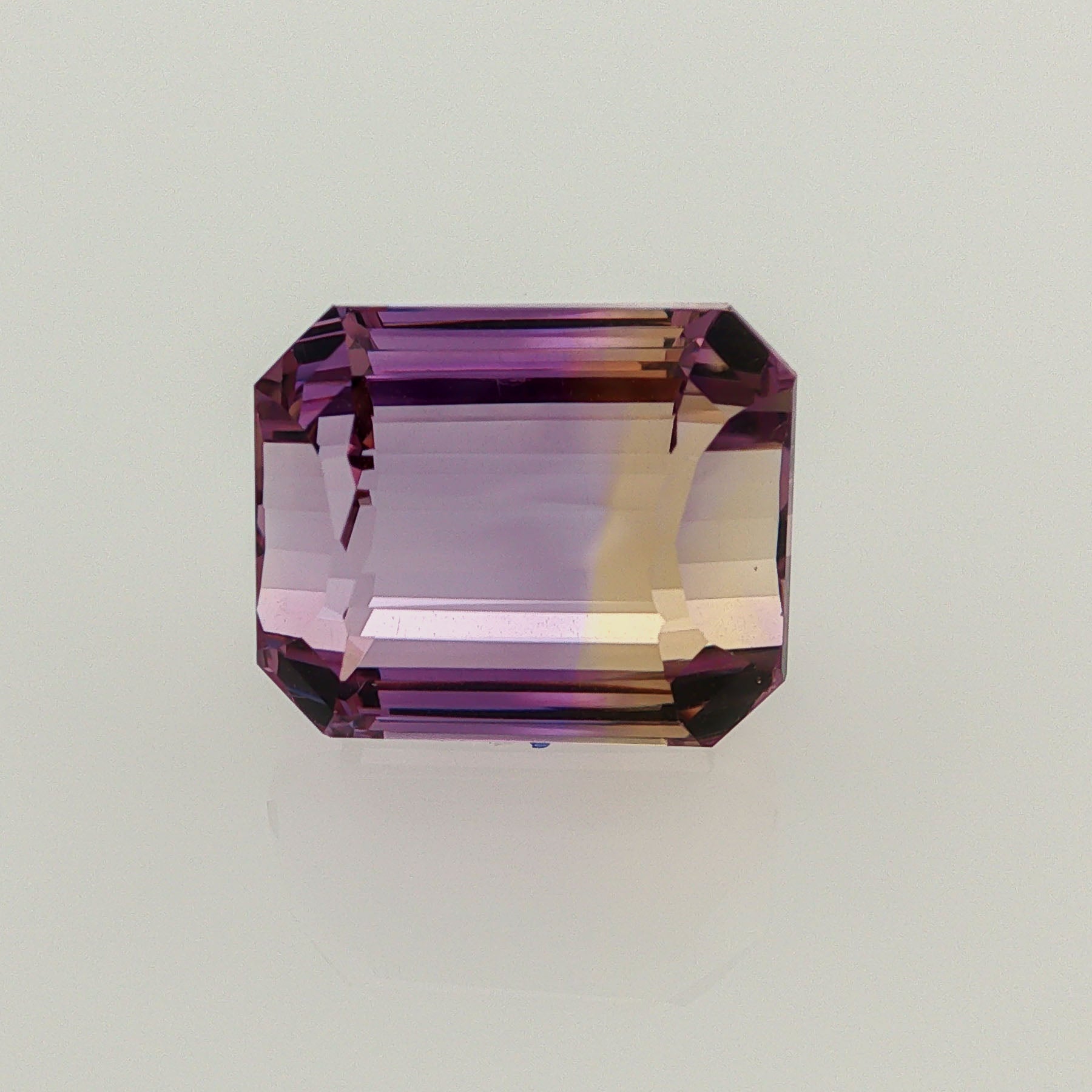 Natural ametrine, bicolor - purple / yellow, octagon cut, 16.22 ct, loose gemstone.