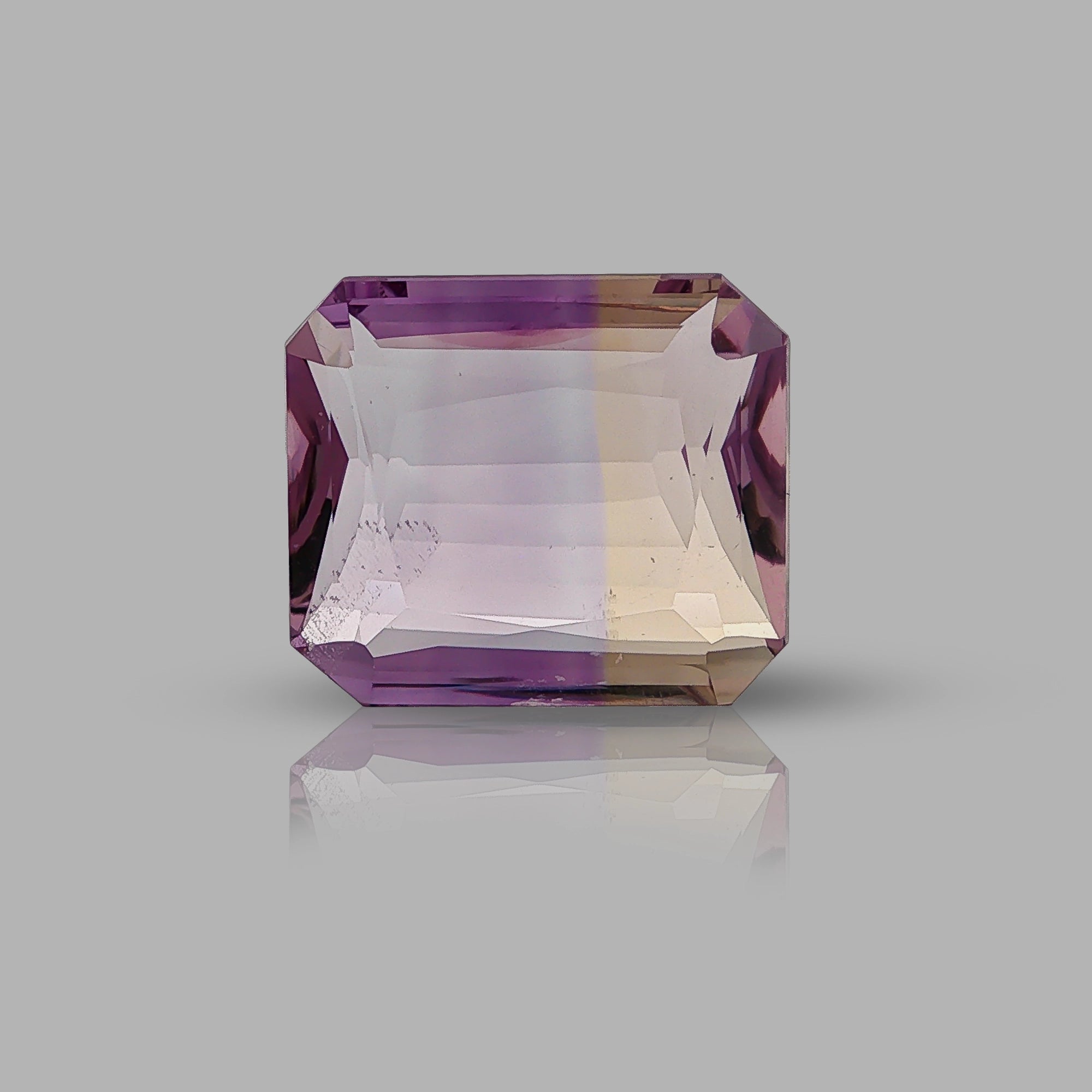 Natural ametrine, bicolor - purple / yellow, rectangle cut, 17.24 ct, loose gemstone.