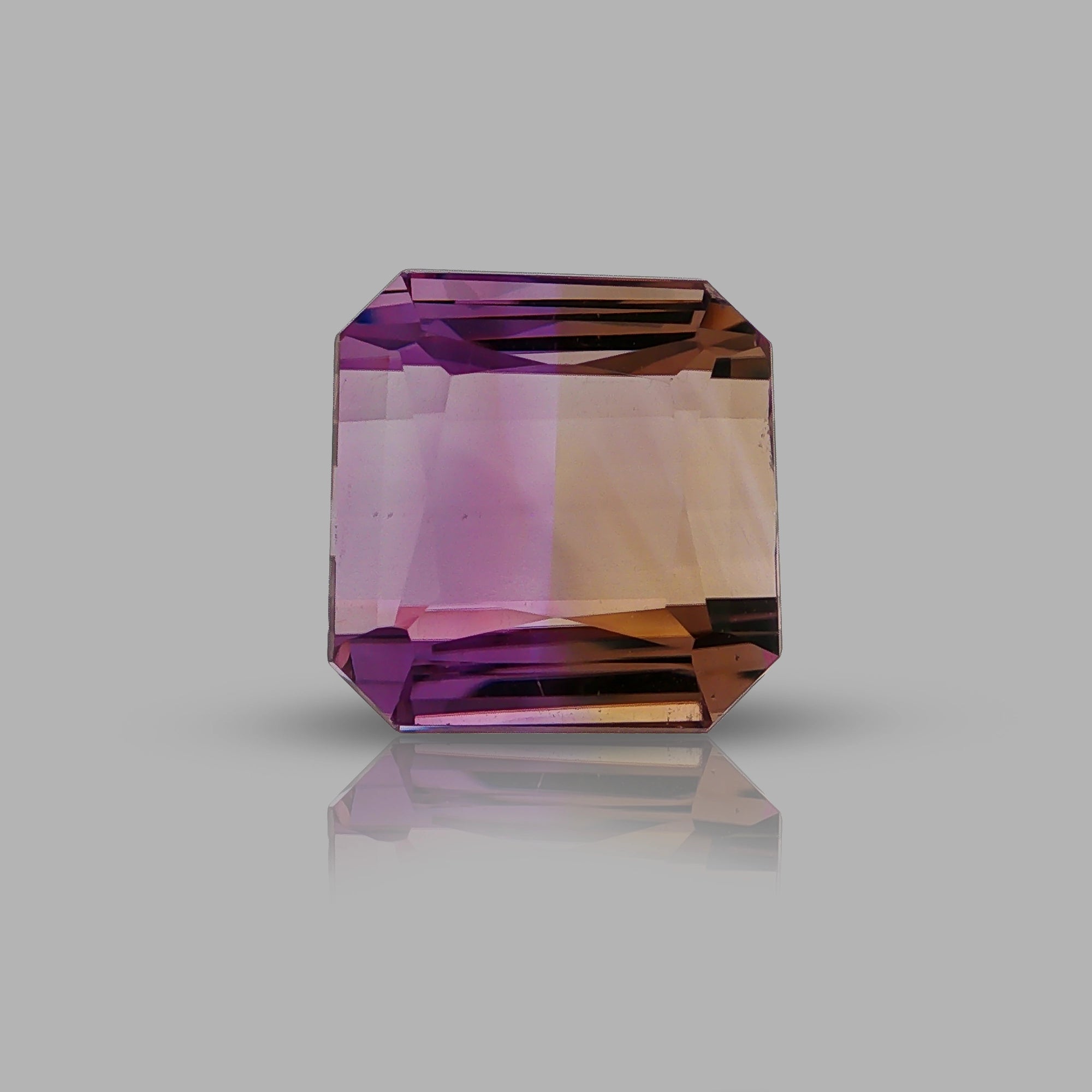 Natural ametrine, bicolor - purple / yellow, octagon cut, 18.43 ct, loose gemstone.