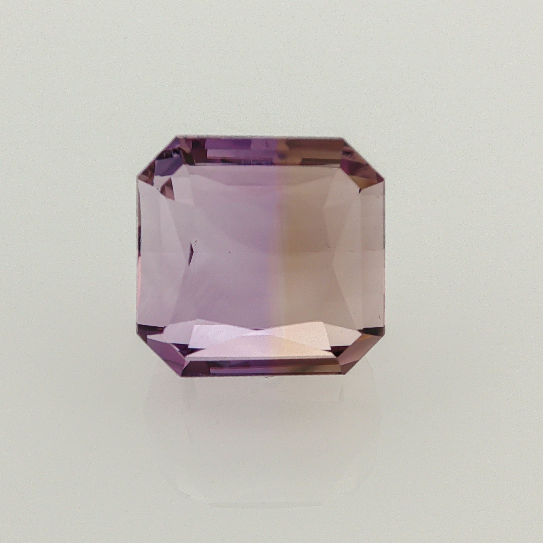 Natural ametrine, light purple / light yellow, octagon cut, 19.6 ct, loose gemstone.