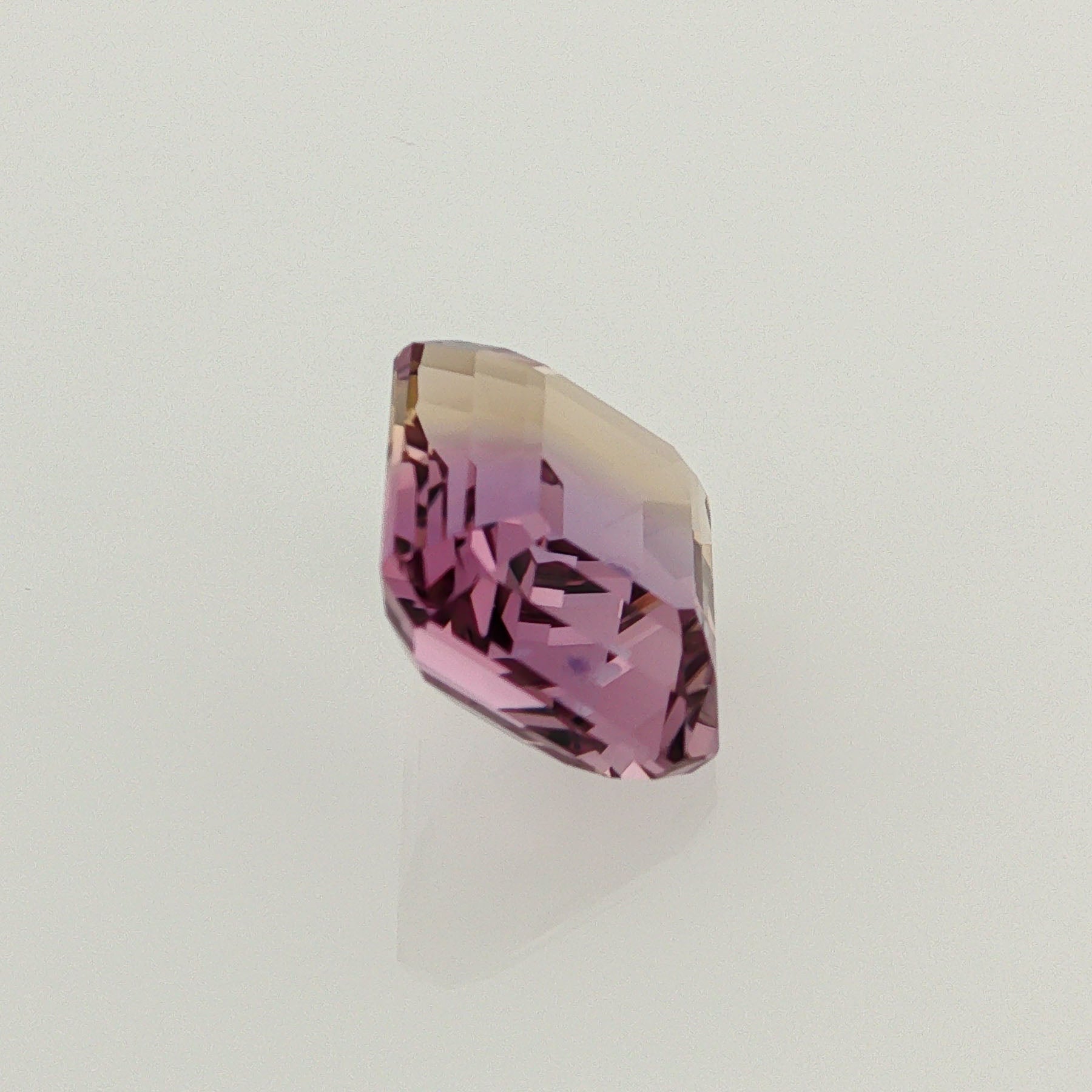 Natural ametrine, bicolor - vivid purple / vivid yellow, emerald cut, 7.18 ct, loose gemstone, view 4.