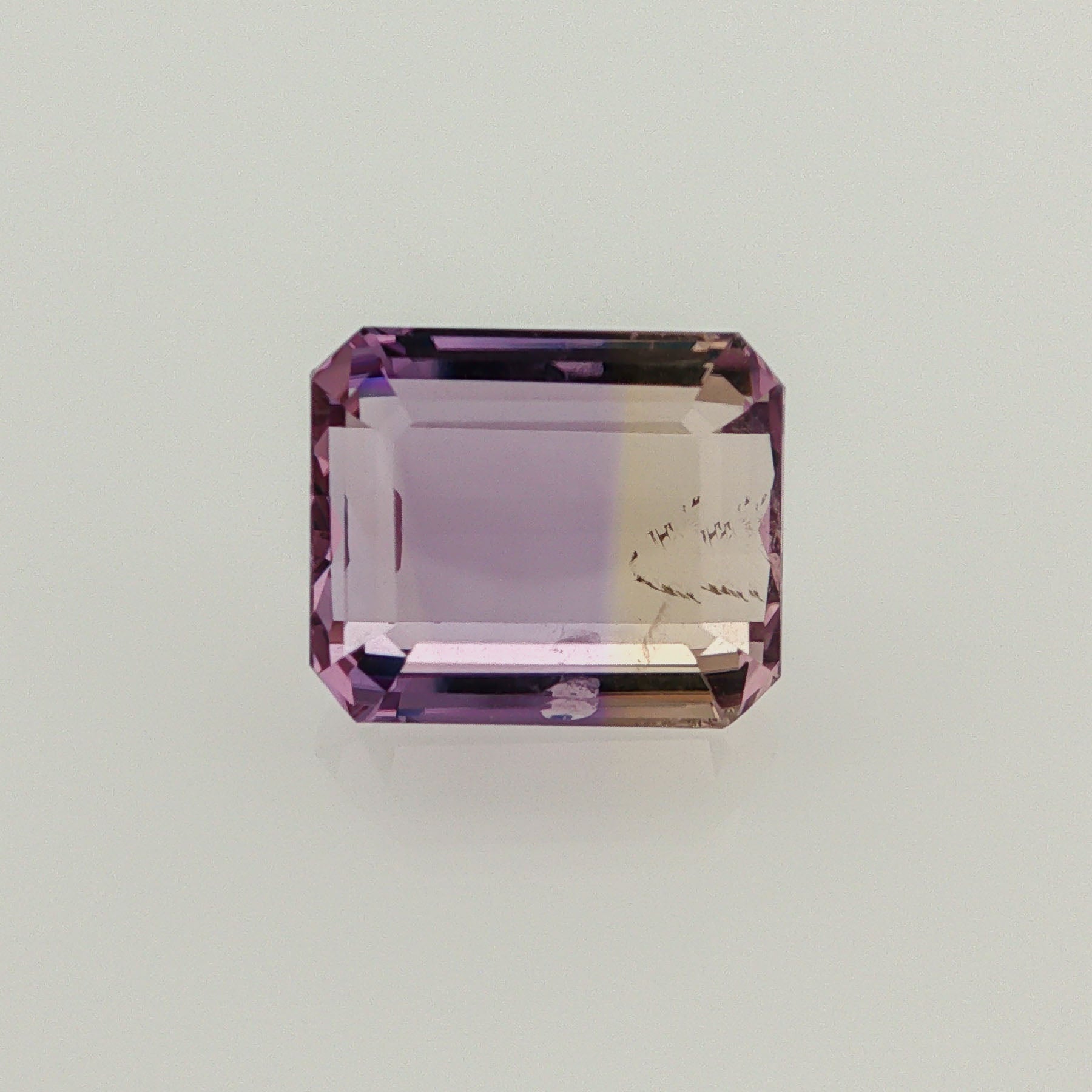 Natural ametrine, bicolor - purple / yellow, emerald cut, 8.29 ct, loose gemstone.