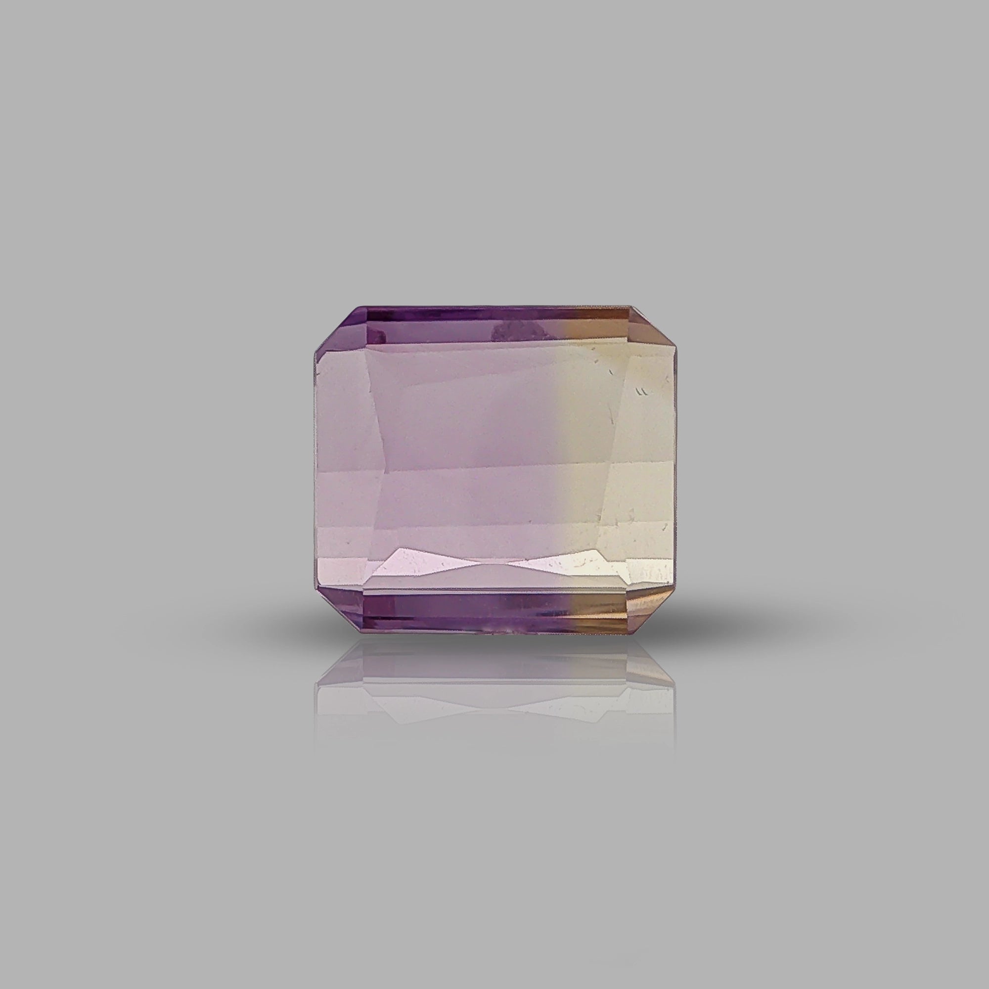 Natural ametrine, light purple / light yellow, rectangle cut, 8.61 ct, loose gemstone.