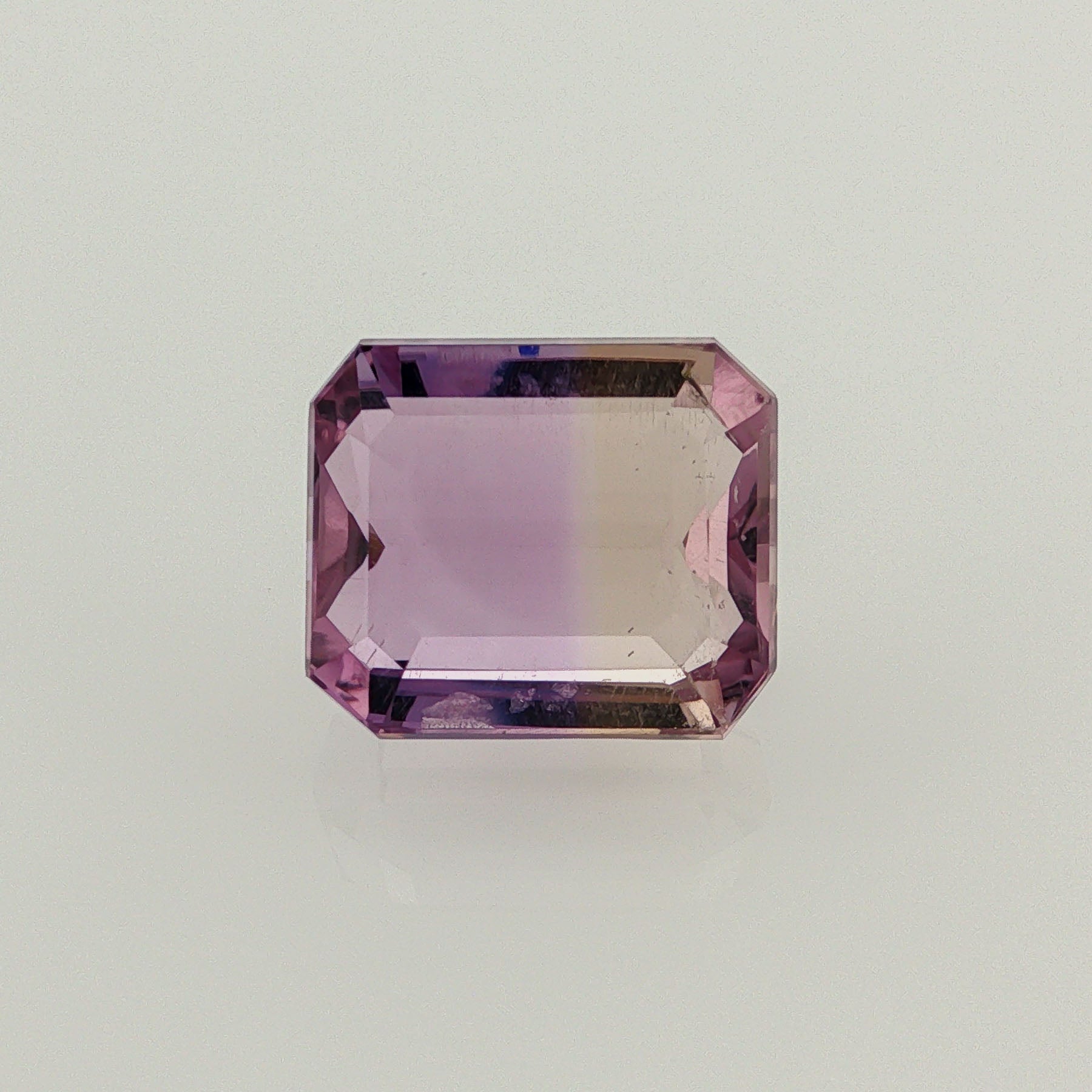 Natural ametrine, bicolor - purple / yellow, octagon cut, 8.67 ct, loose gemstone.