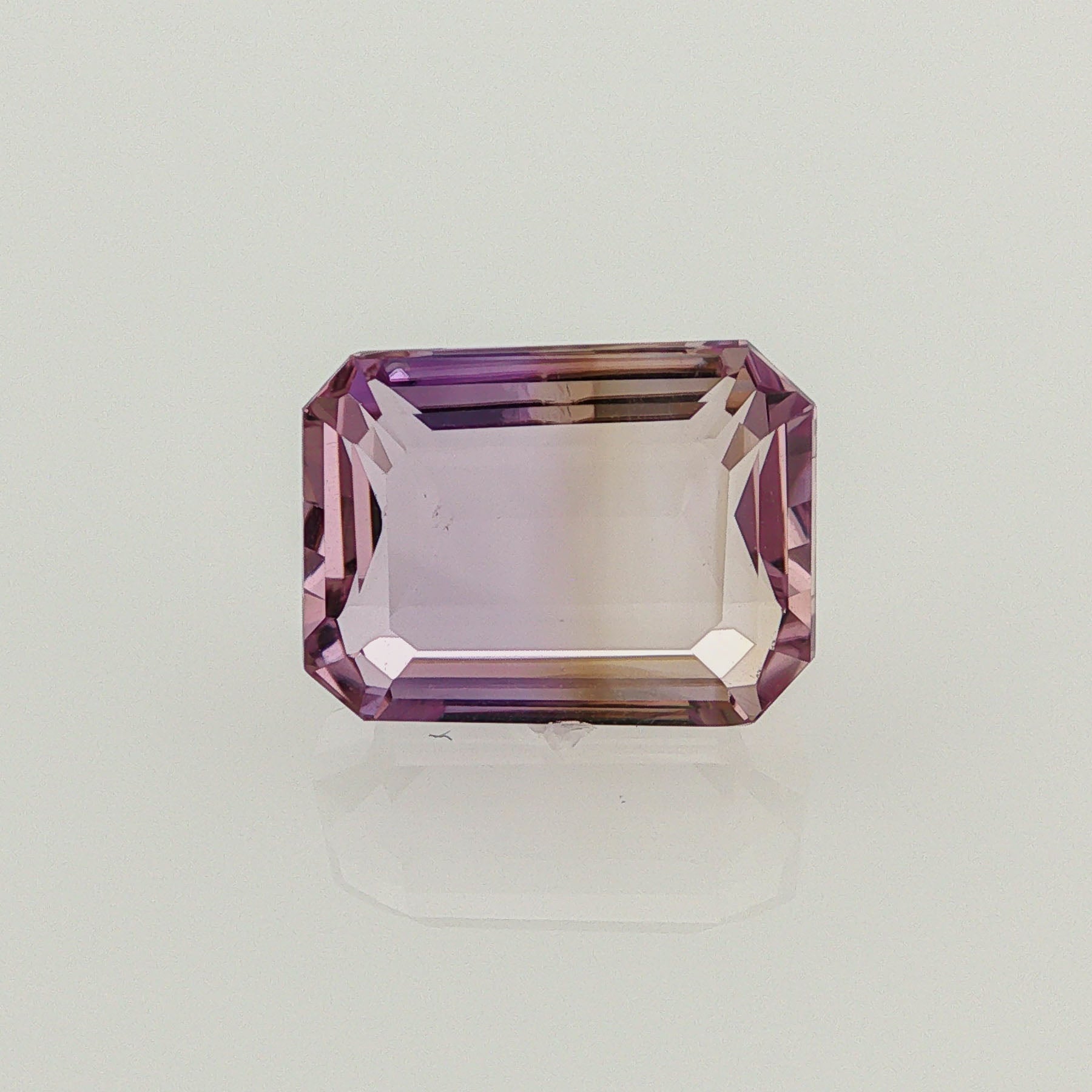 Natural ametrine, bicolor - purple / yellow, emerald cut, 8.87 ct, loose gemstone.