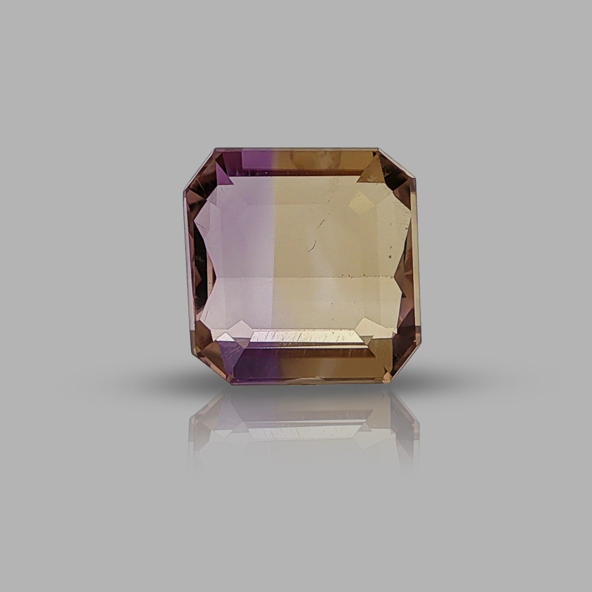 Natural ametrine, bicolor - purple / yellow, rectangle cut, 8.97 ct, loose gemstone.