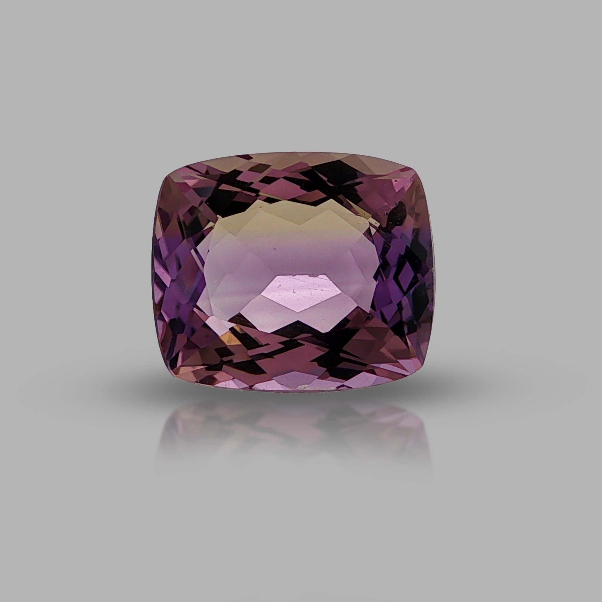 Natural ametrine, bicolor - purple / yellow, cushion cut, 9.05 ct, loose gemstone.
