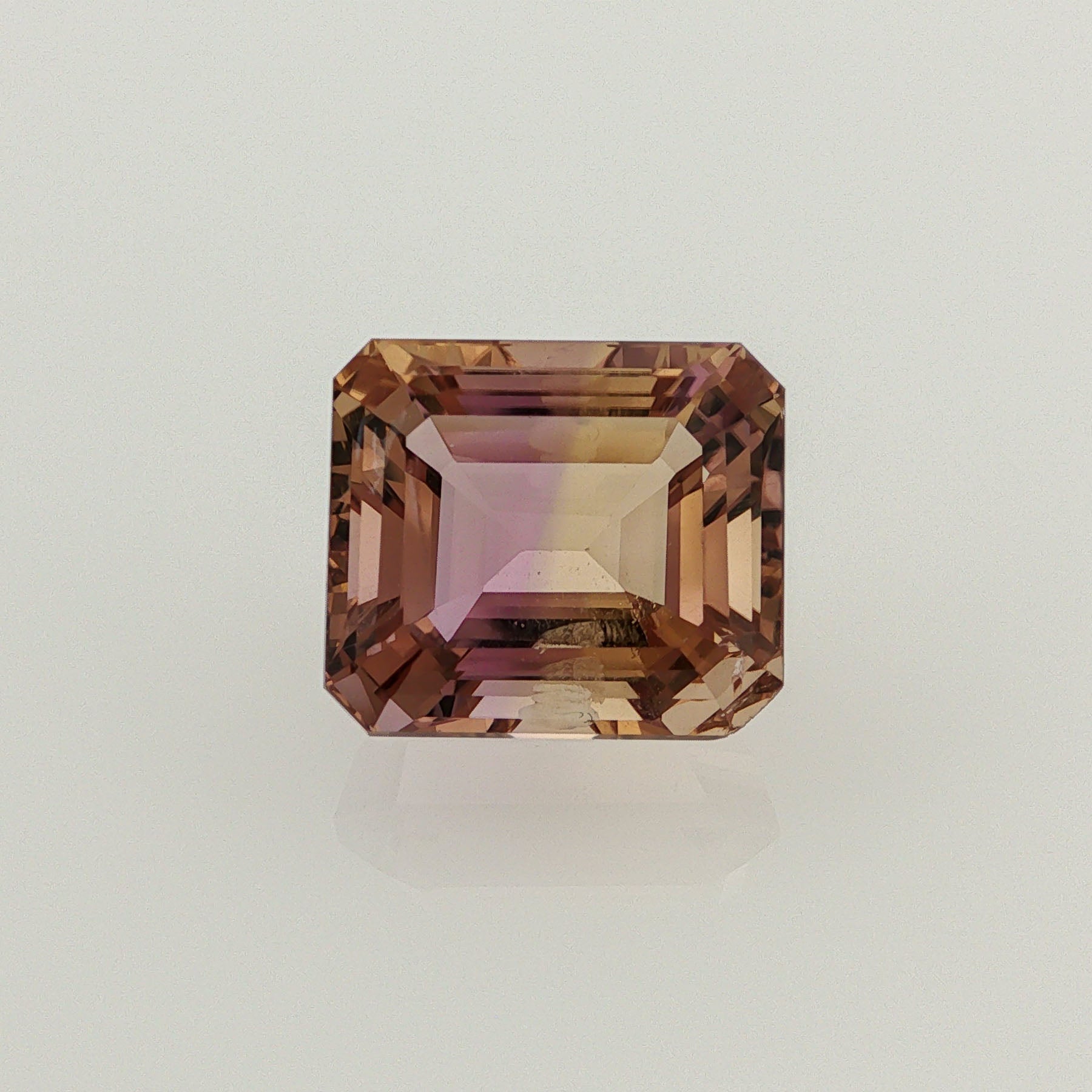 Natural ametrine, light purple / light yellow, emerald cut, 9.91 ct, loose gemstone.