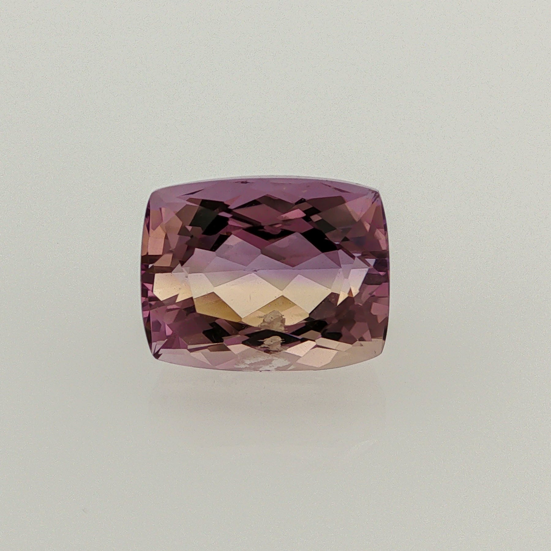 Natural ametrine, light purple / light yellow, cushion cut, 9.94 ct, loose gemstone.