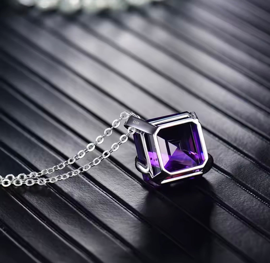 Natural Asscher-style amethyst diamond pendant in 18K white gold side view
