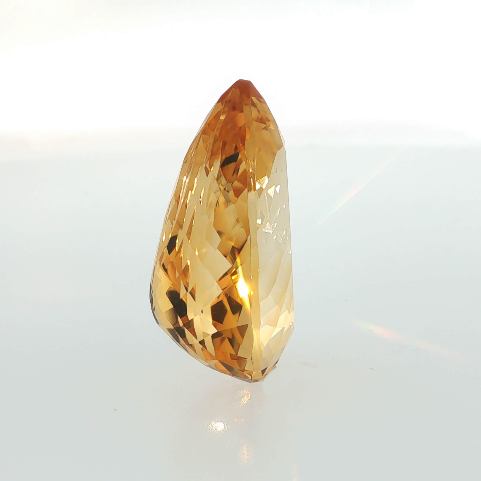 Natural citrine, 42.68 carats, pear cut, golden-yellow color, measuring 28.28 × 21.12 × 13.28 mm